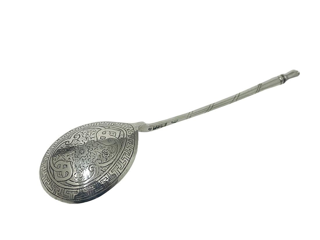 19th Century Russian silver spoon, Moscow 1867

A Russian silver spoon with an engraved spoon tray on the outside on a long handle. 
Russian silver hallmark for Moscow, the hallmark for Viktor Savinkov, the year 1867. 
The right hallmark is the