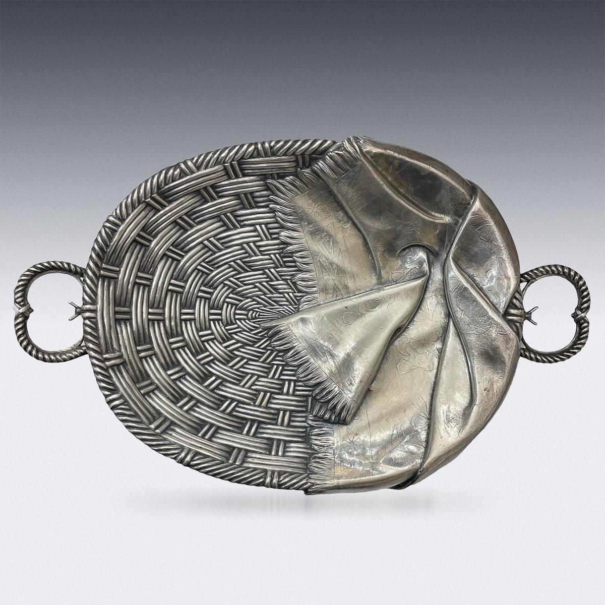 Russian sliver trompe l’oeil basket, Moscow 1878 , marked 84 for Russian silver with GL in Cyrillic for Grigoriy Laskutov, retail mark of Khlebnikov.

CONDITION
In Great Condition - Please refer to photographs.

SIZE
Height: 5.5cm
Width: 38cm
Depth: