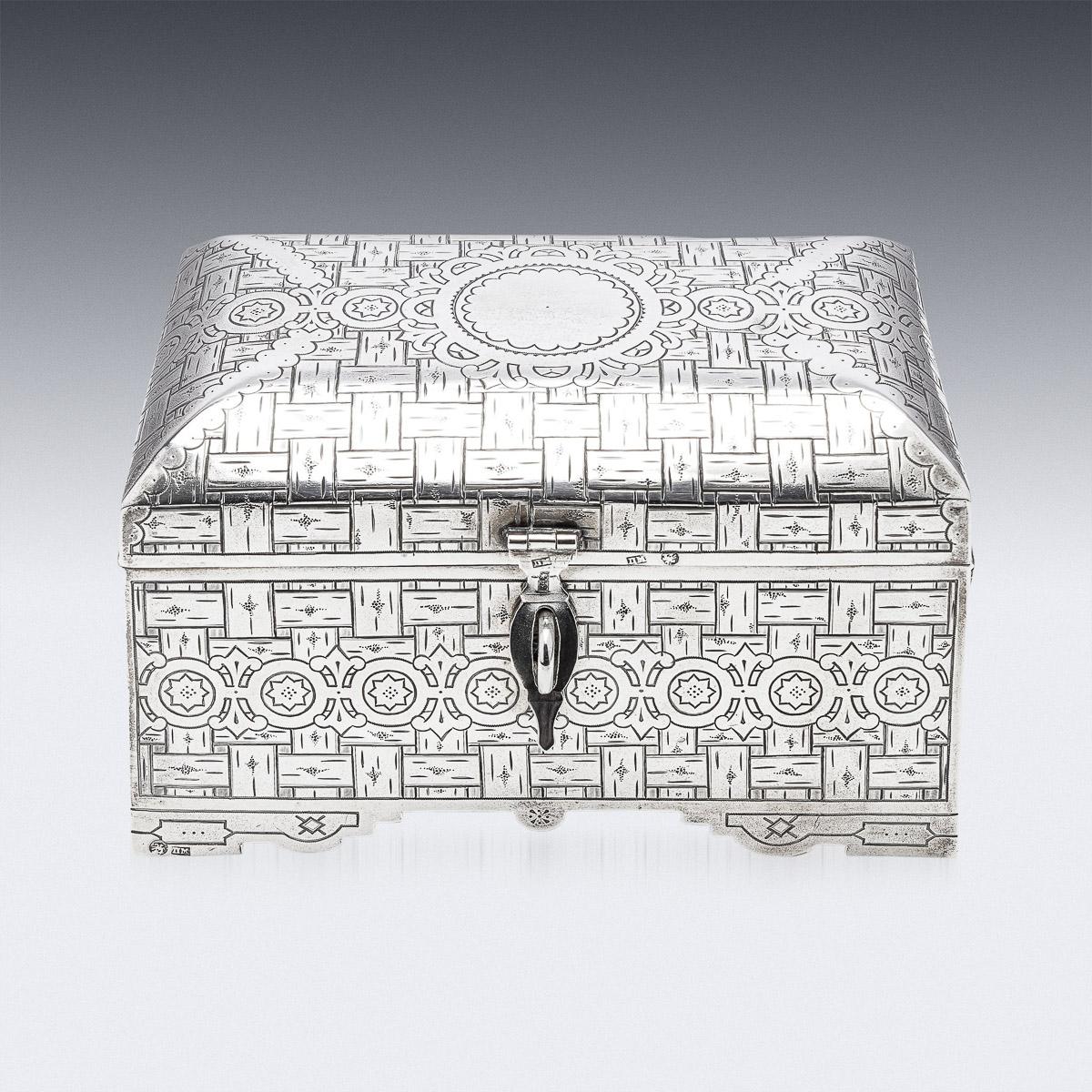 Antique 19th Century Imperial Russian solid silver trompe l'oeil box, rectangular casket shaped and with shaped hindged handles and lock, richly gilt interior. Hallmarked Russian Silver 84 (875 standard), Moscow, year 1891, Maker's mark in Cyrillic