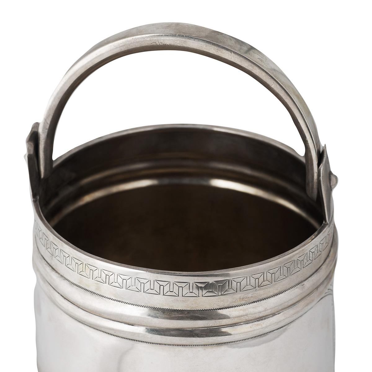 Antique 19th century Imperial Russian solid silver large ice pail, big enough for a bottle of vodka, bucket shaped with swinging handle, strap work along the top and bottom, with stylized boarders and blasted matte body. Hallmarked Russian silver 84
