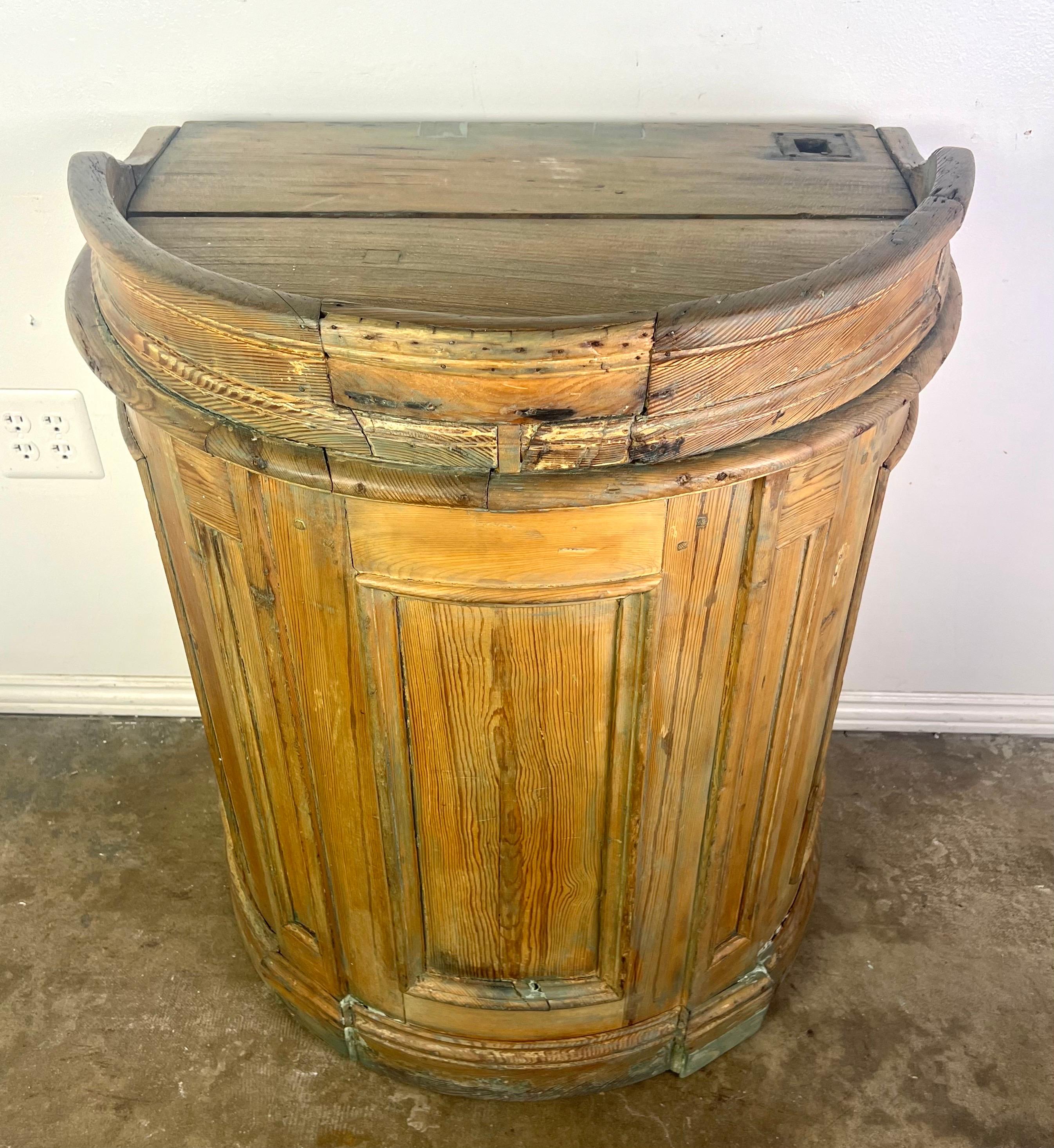 19th C. rustic alter table with a weathered appearance.  The wood exhibits a natural, unfinished look, with visible grain and signs of age, such as cracks, knots, and color variations.

The alter table has a simple yet sturdy design, with some