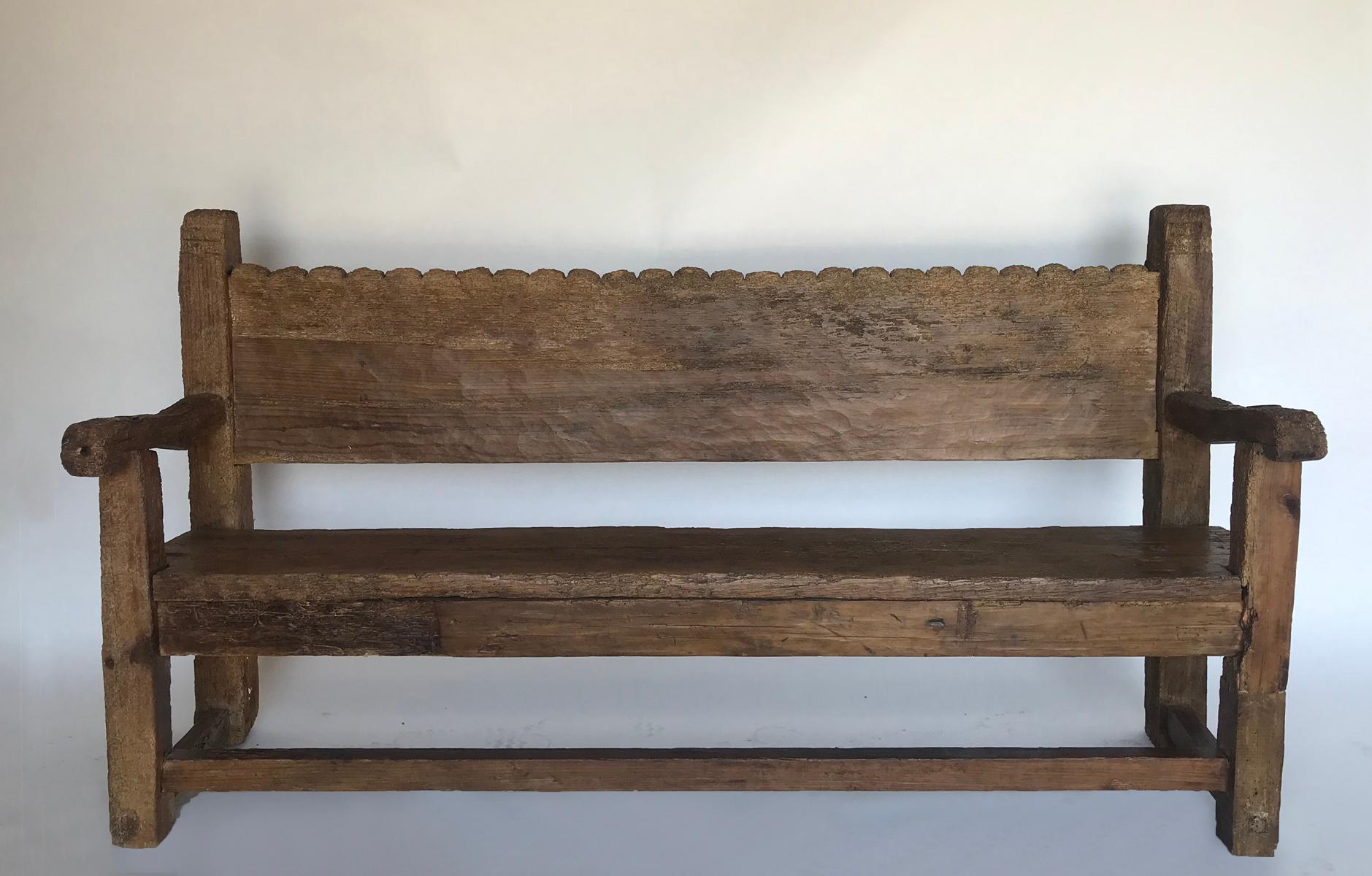 rustic wooden bench with back