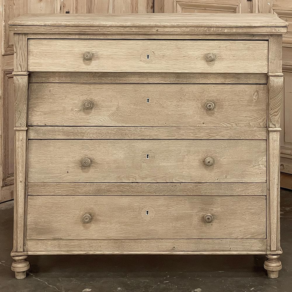 19th Century Rustic Charles X Commode ~ Chest of Drawers in Stripped Oak combines a majestic, regal style with the soft texture and natural coloration of patinaed oak to make a piece that will work with a wide variety of decors. The solid plank top