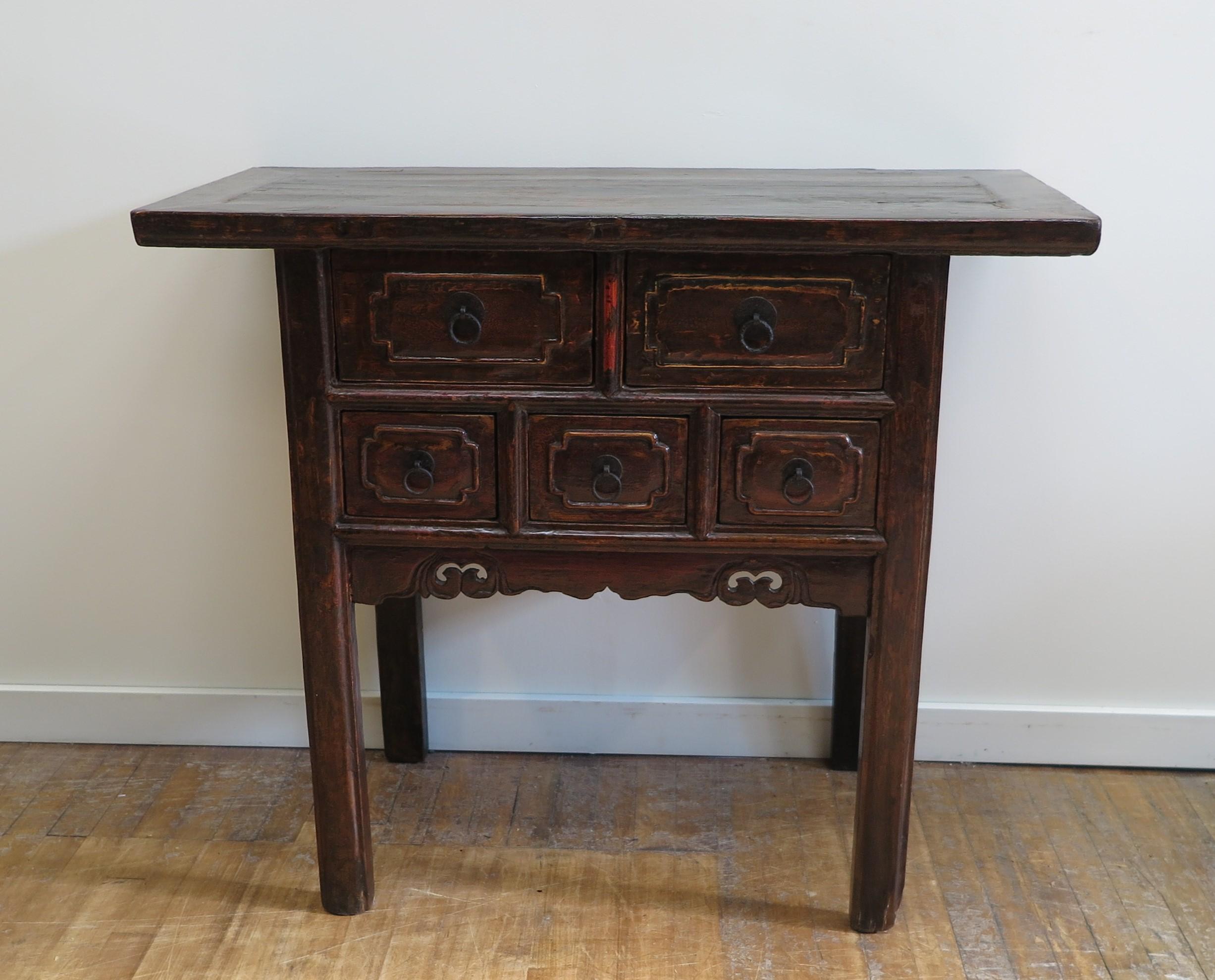 19th century Rustic Table five-drawer console table, also referred to as a wine table.  Antique Chinese table with carved drawer plates, lower carved apron and a beautiful patina having worn red lacquer showing through, circa 1850.  This is a