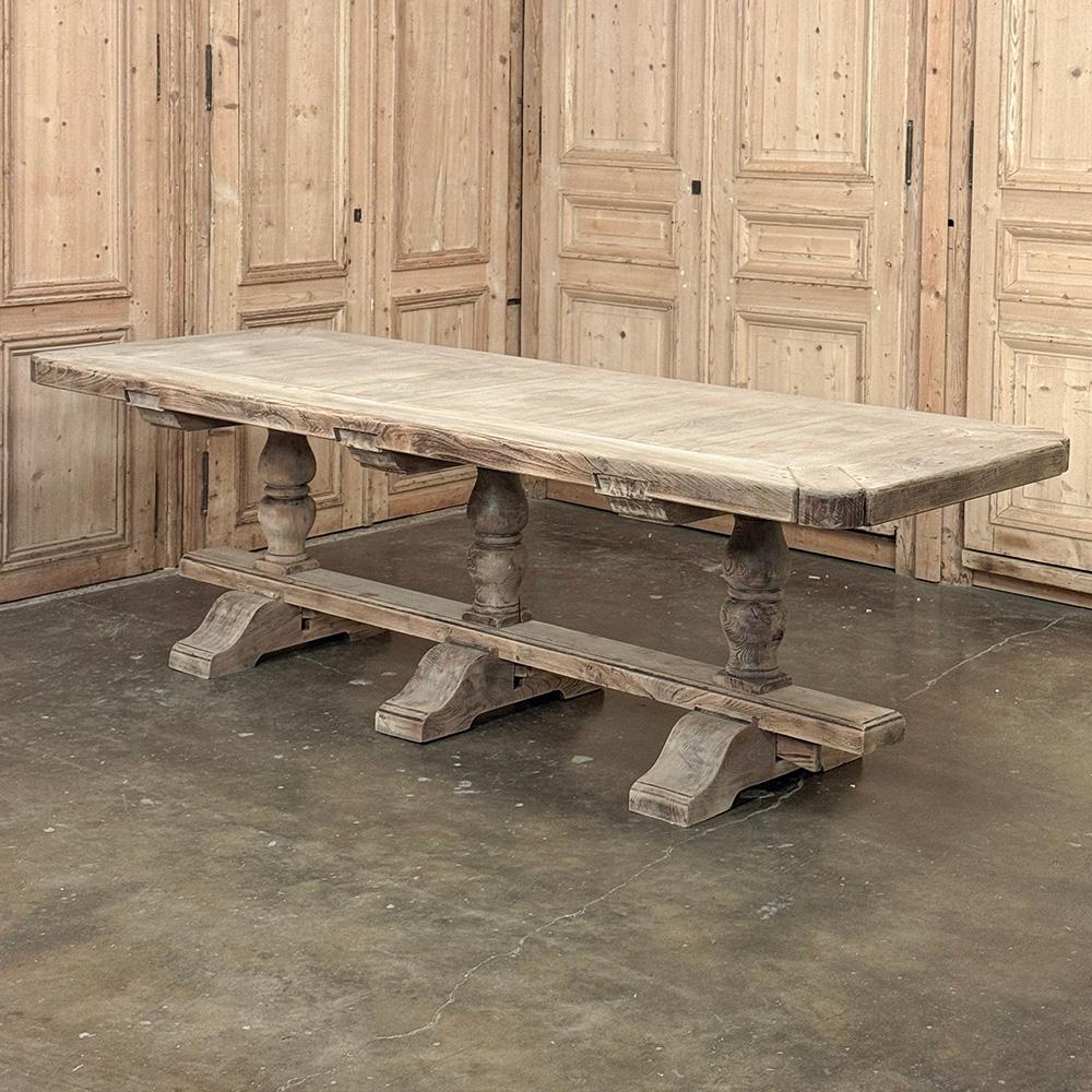 Antique Rustic Country French Triple Pedestal Trestle Dining Table represents the epitome of traditional craftsmanship!  Utilizing techniques handed down from generation to generation, the artisans who created this table utilized their relatively