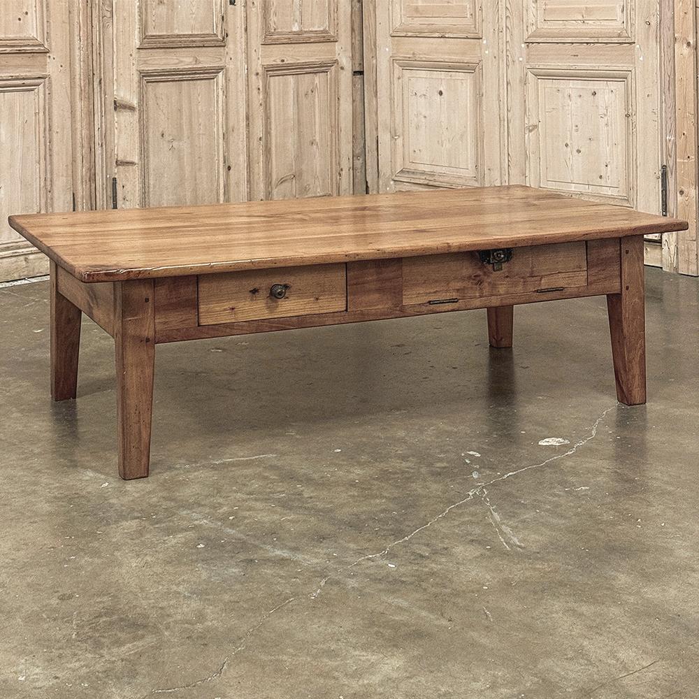 19th Century Rustic County French Pine Coffee Table was hand-crafted from old-growth yellow pine, which is actually harder than some woods classified as 