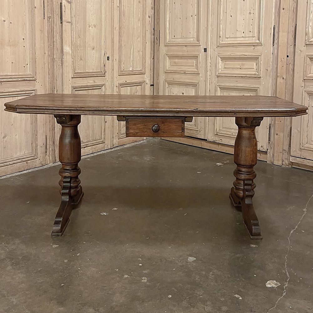 19th century Rustic desk ~ sofa table was hand-crafted from solid oak to last for centuries! The thick plank top has four mitered corners eliminating sharp edges, with a molding detail that adds a little flair. Support is provided by a pair of