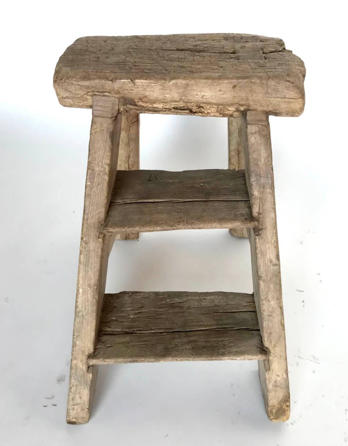 Wonderfully rustic, old Elm wood step stool or ladder. Mortise and tenon construction. Sturdy and functional, naturally worn, faded patina.