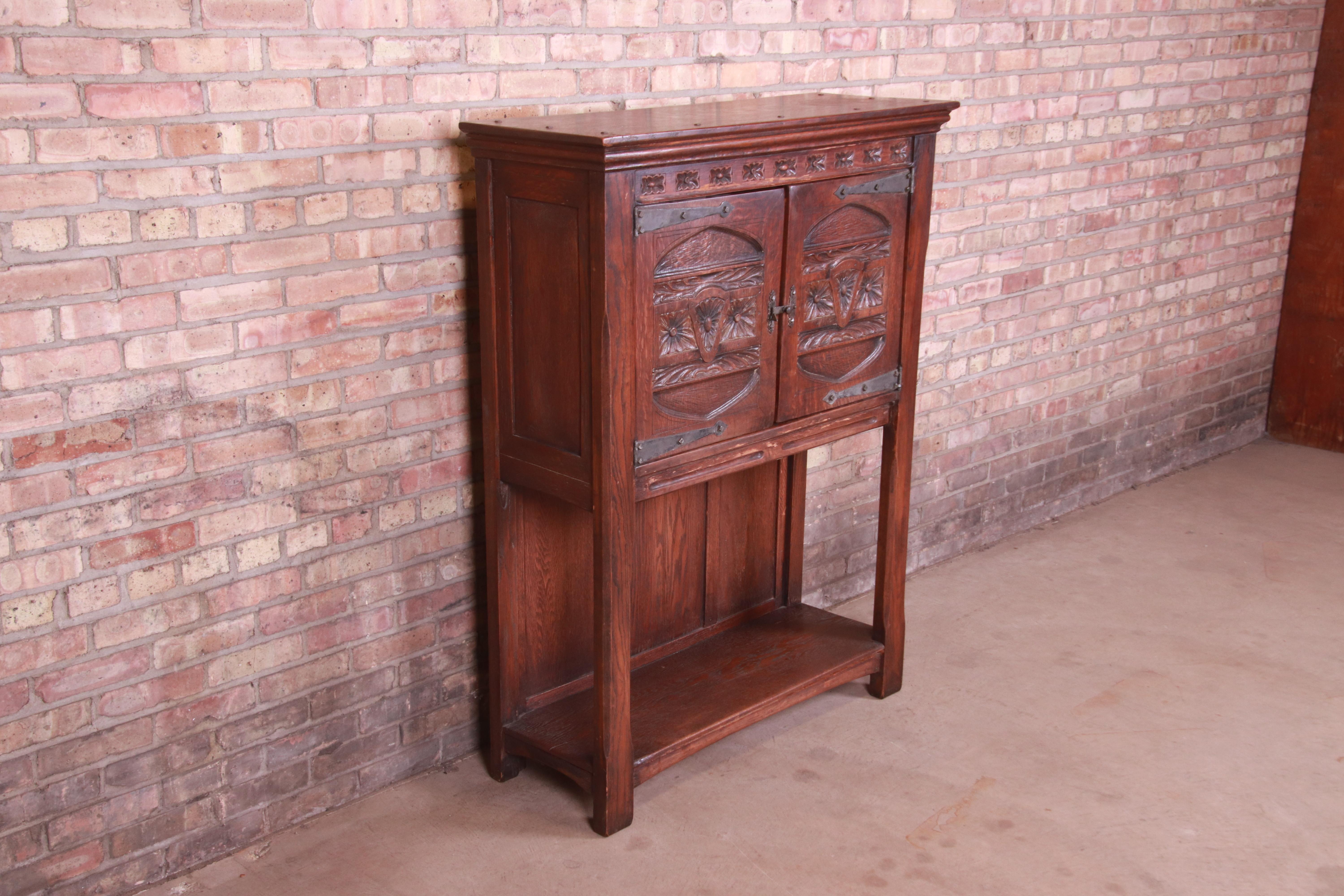 Iron 19th Century Rustic European Carved Oak Bar Cabinet