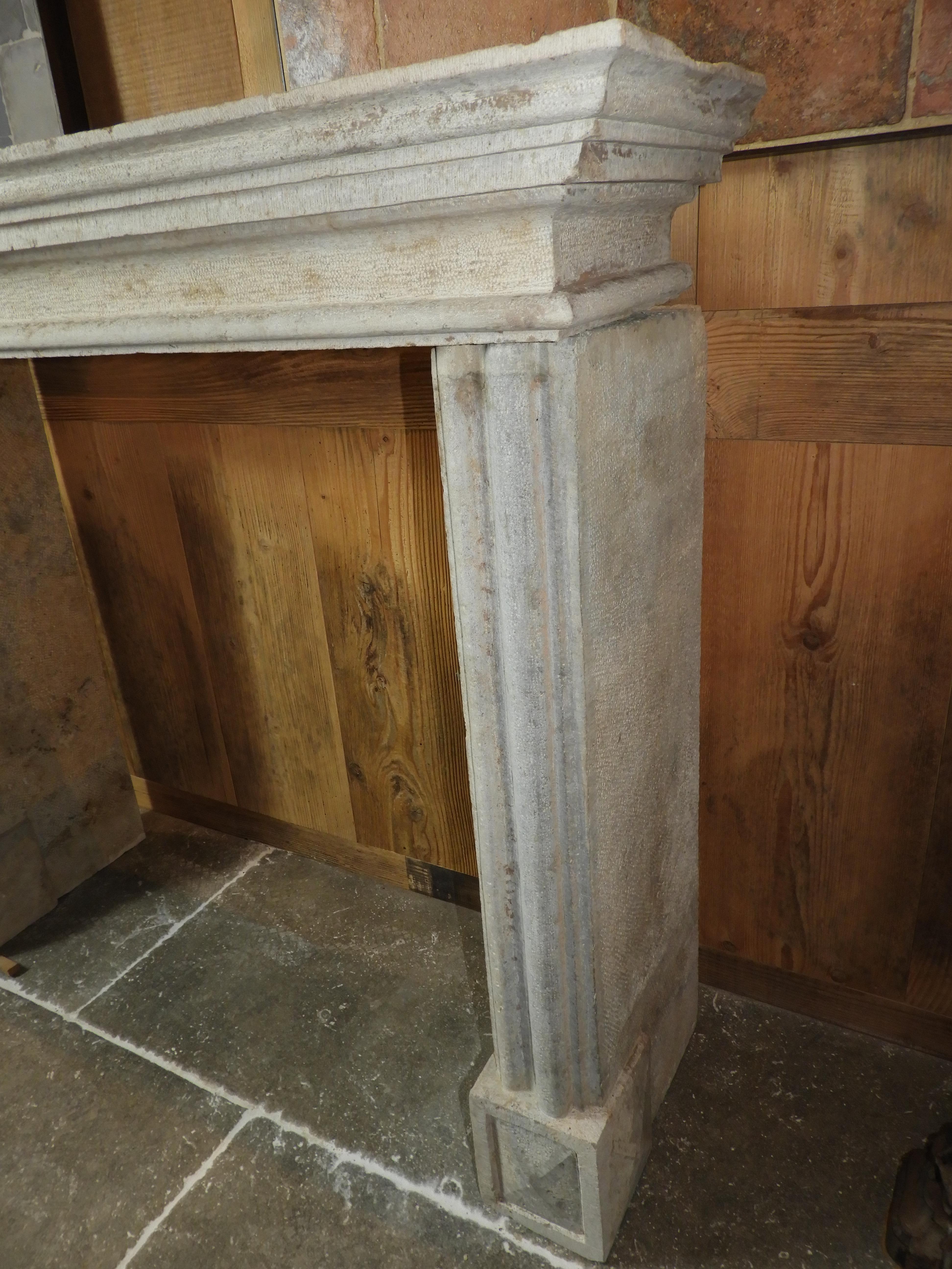 Hand-Carved 19th Century Rustic Fireplace in Hard French Limestone For Sale