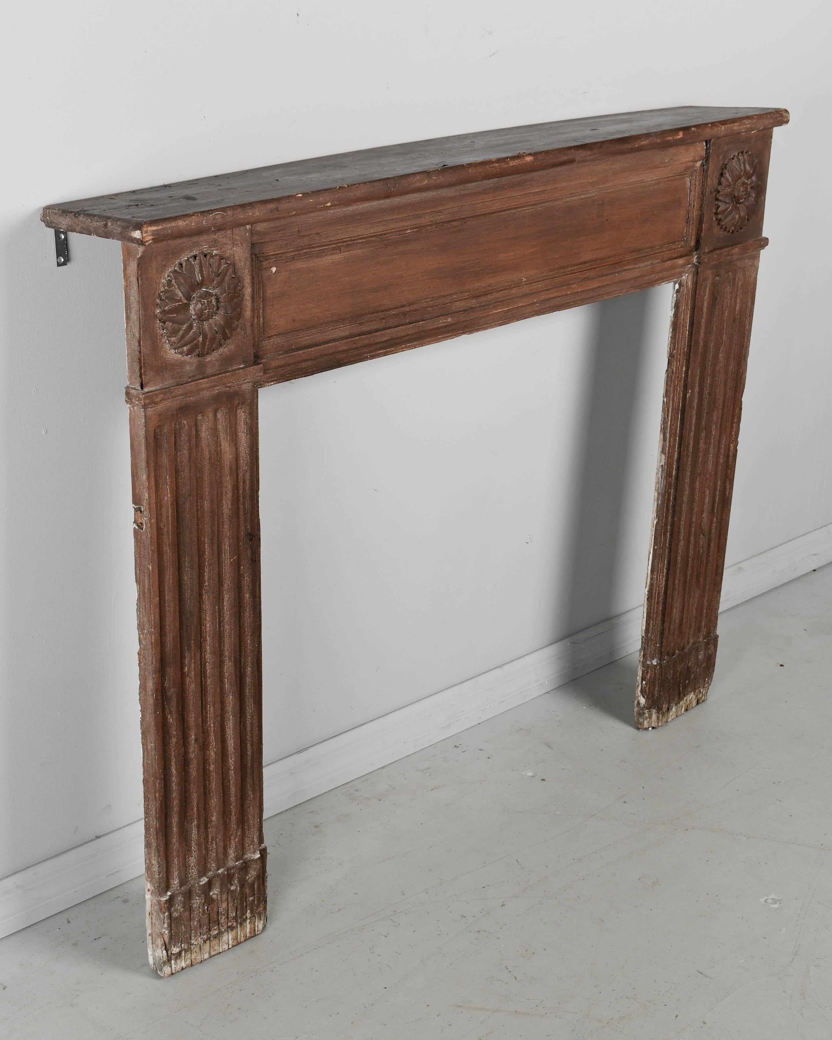 Hand-Carved 19th Century Rustic French Pine Fireplace Mantel