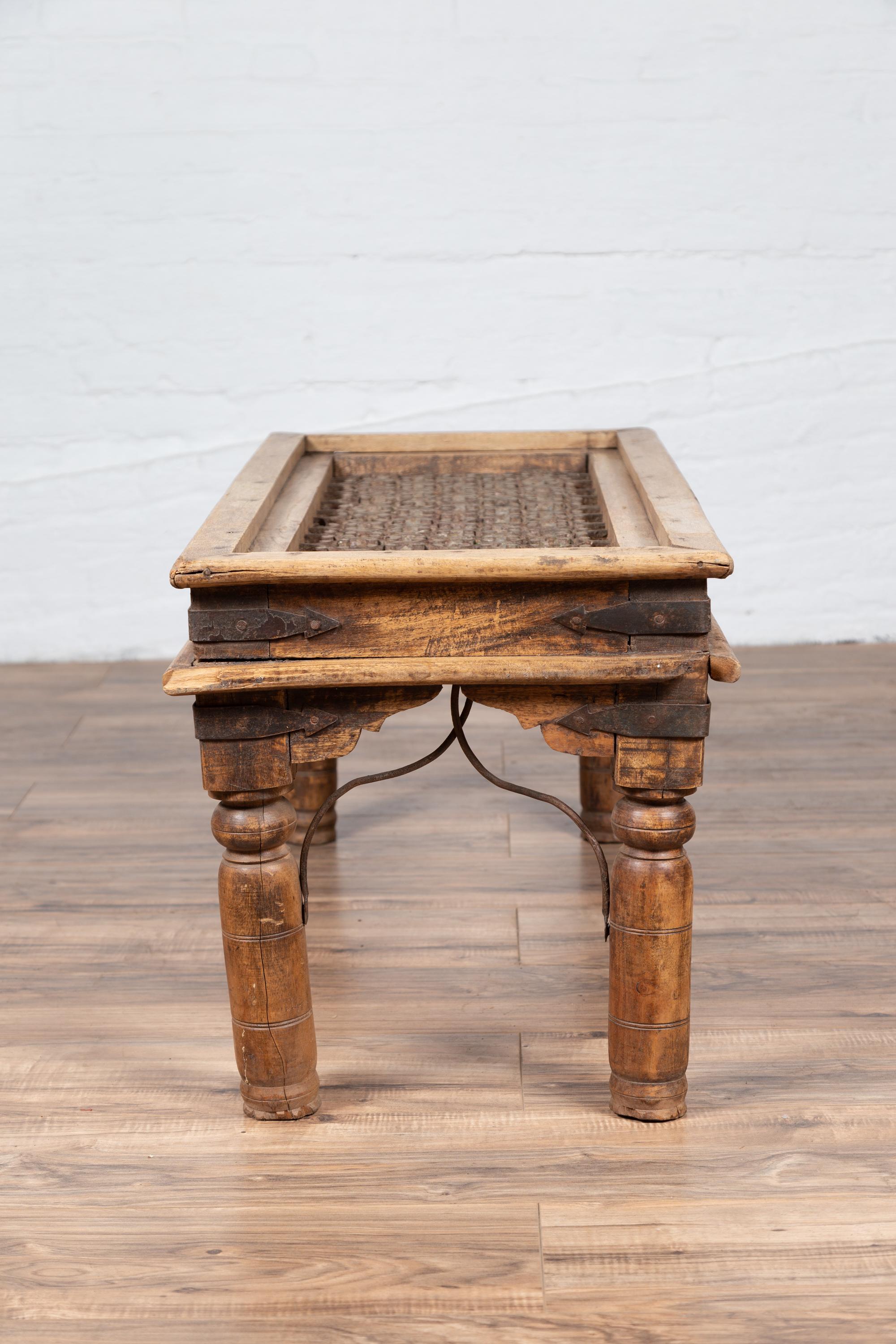 19th Century Rustic Indian Window Grate Coffee Table with Scrolled Iron Motifs 11