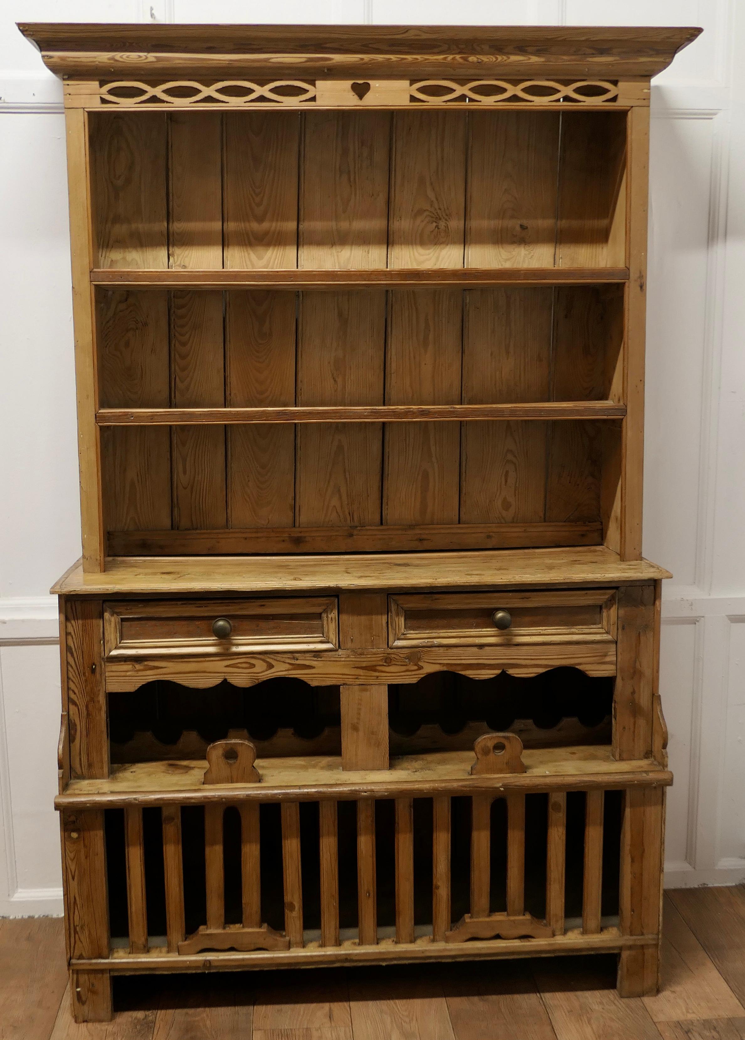 19th Century Rustic Pine Irish Chicken Hutch Dresser

This dresser is a genuine Irish piece with as much of a rustic look that anyone could want, it has a wonderful Rustic patina which has been made mostly by Irish wood worm and if you are familiar