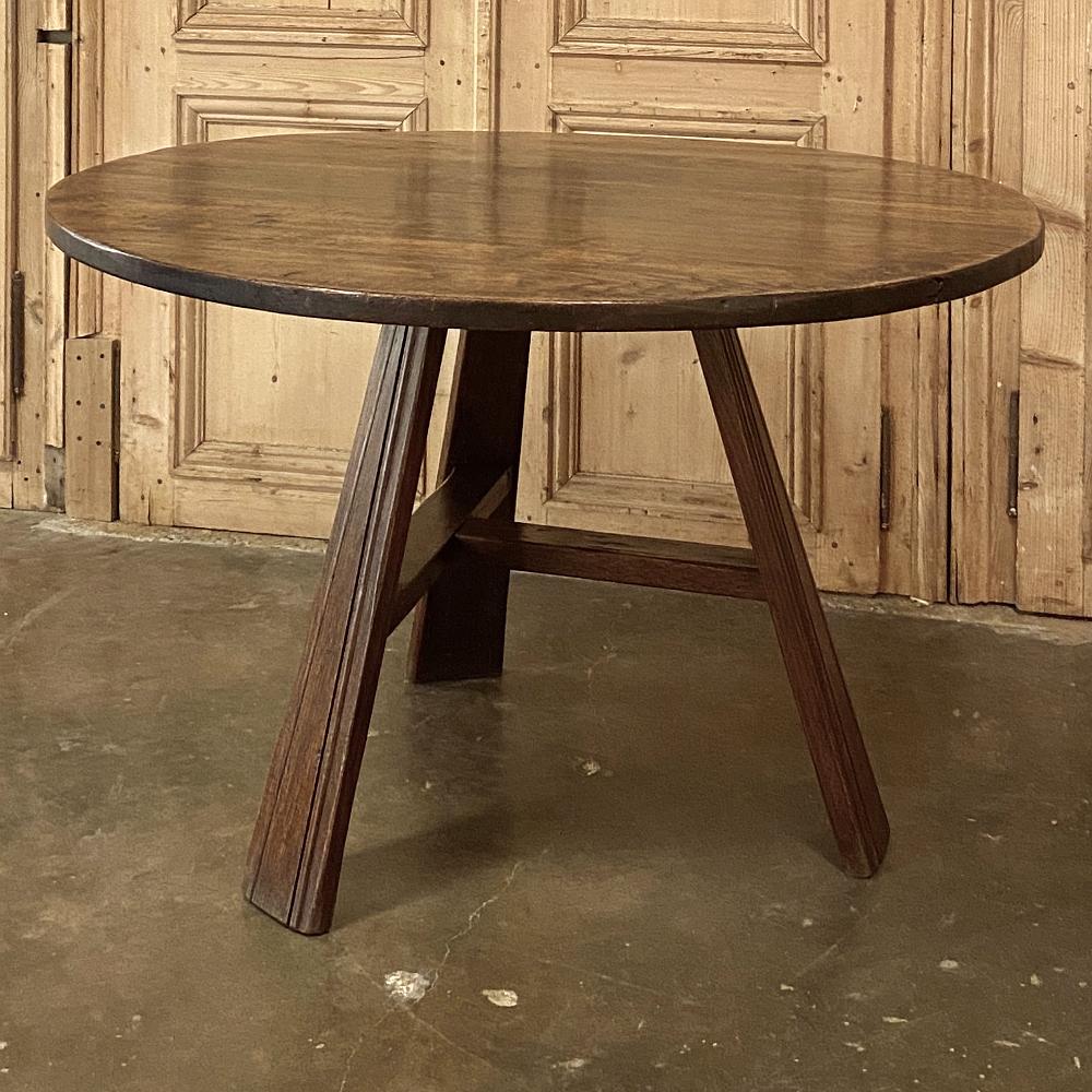 19th century rustic round breakfast table ~ game table was handcrafted from solid planks of old-growth oak, and features a three legged design connected with a 