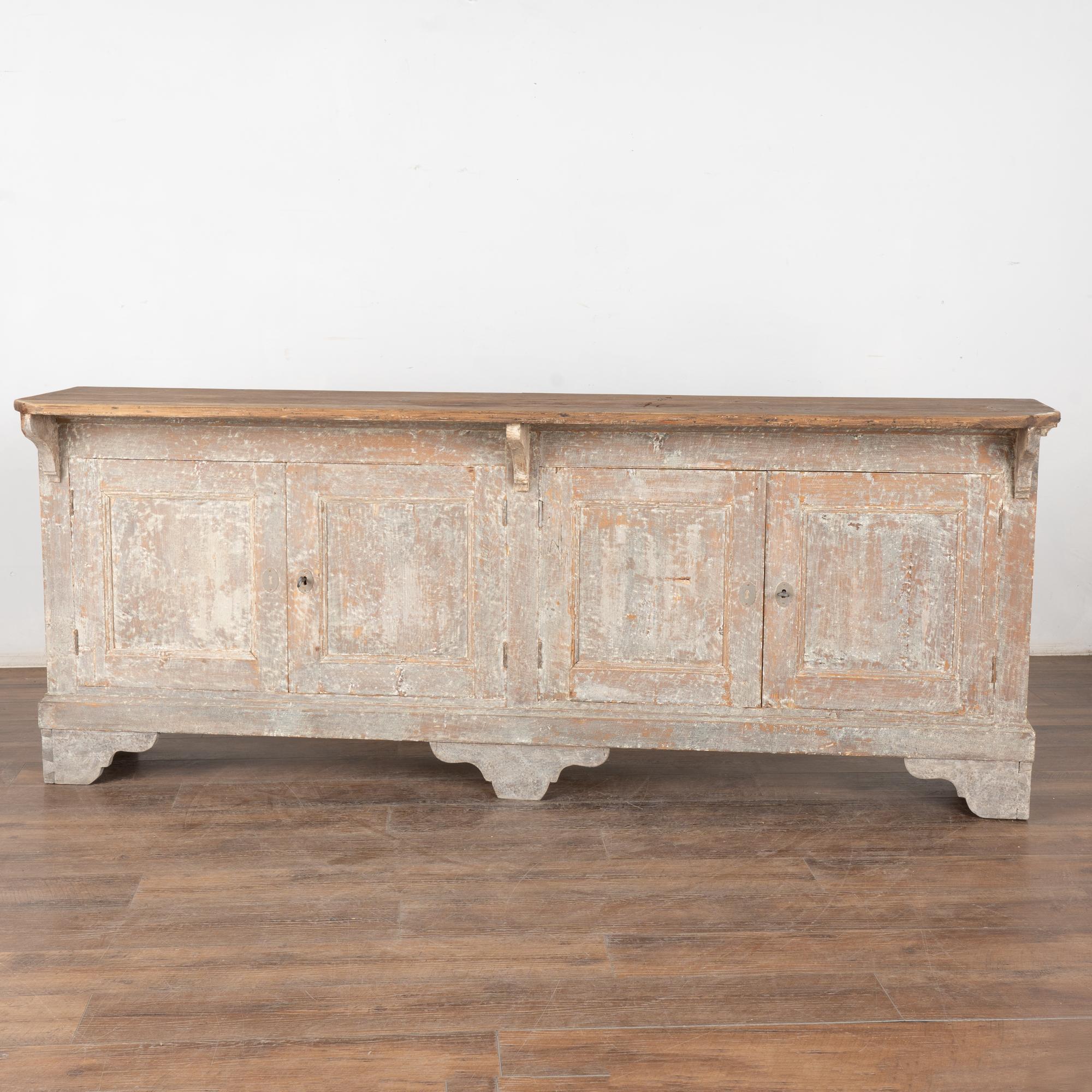 Unique narrow Swedish gray painted sideboard/buffet with natural wood top creating a 6.25