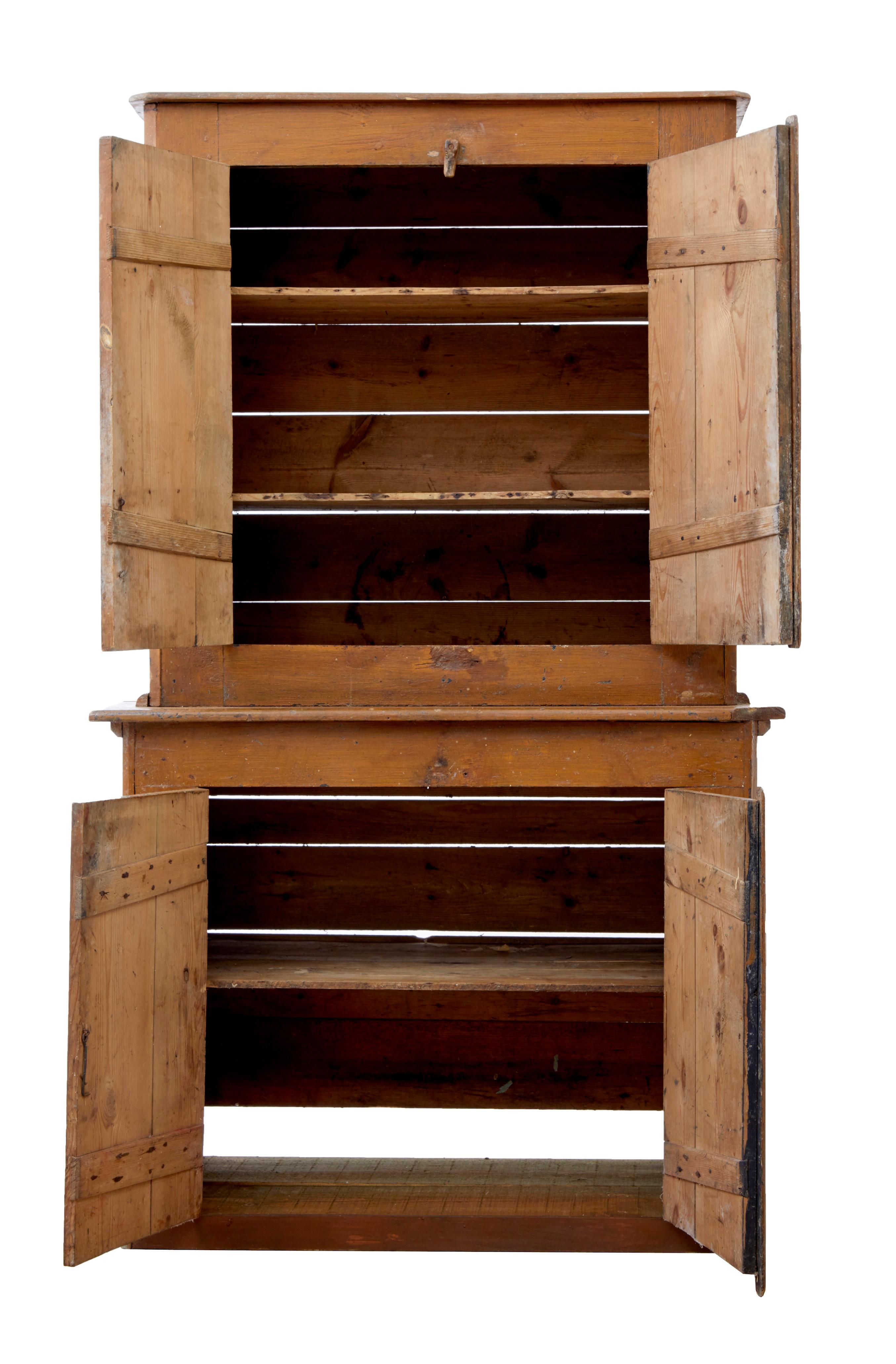 19th century rustic Swedish pine painted kitchen cupboard, circa 1860.


Here we offer a rural piece of furniture. Naive in construction this 2 part cupboard is full of charm. Top section with 2 shelves and bottom section with a single shelf.