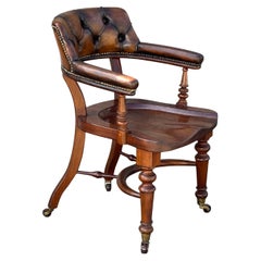 Fauteuil de bureau en cuir du 19e siècle à assise sellier