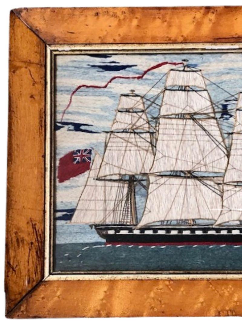 Tableau de laine de marin du XIXe siècle représentant une frégate britannique battant pavillon rouge, vers 1850, un tableau de laine de marin fait à la main représentant un navire de guerre britannique avec un seul pont de canons, sous toutes les