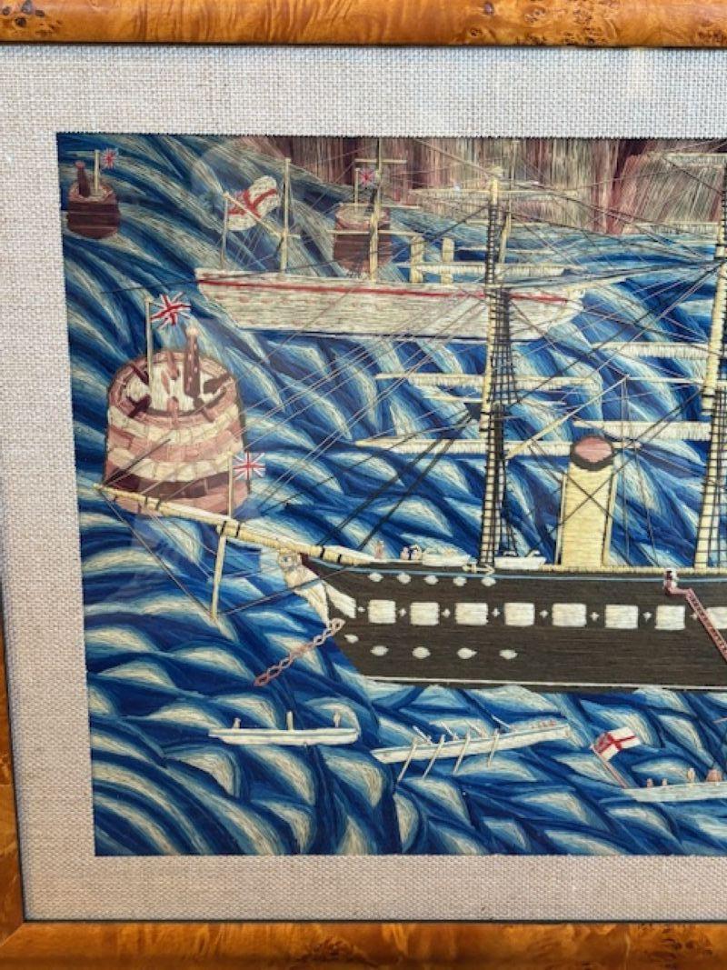19th Century Sailor's Woolie of British Fleet in The Solent, circa 1870, a British sailor's hand-crafted woolwork picture of a British naval fleet in The Solent between the Isle of Wight and England, with three ships, two gunboats, a galley and a