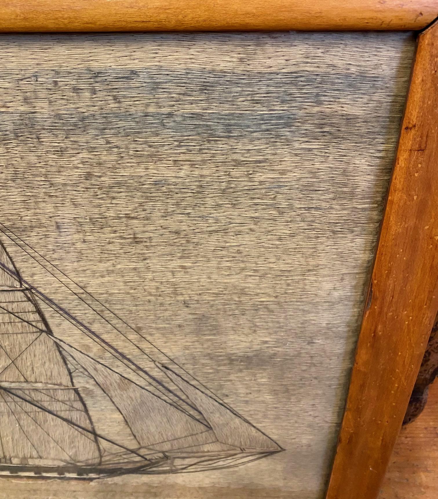 19th Century Sailor's Woolie of a Frigate, circa 1840, a British sailor's hand crafted woolwork depicting a British single decker frigate under full sail, flying ensign of the red fleet at the stern - a large vessel set against pastel sky and sea