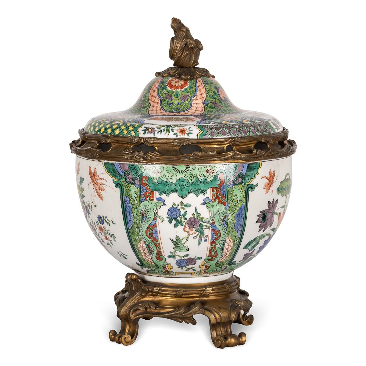 Antique 19th Century Samson vase and cover decorated with polychrome enamel, depicting scenes of various flora, fauna and stylised oriental decoration, lid mounted with ormolu, scrolling acanthus finial and raised on four-feet scroll