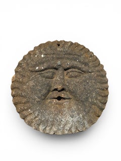 Escultura de caño de fuente de máscara solar de arenisca del siglo XIX