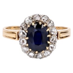 Bague marguerite en or jaune 18 carats, platine, saphir et diamants du 19e siècle