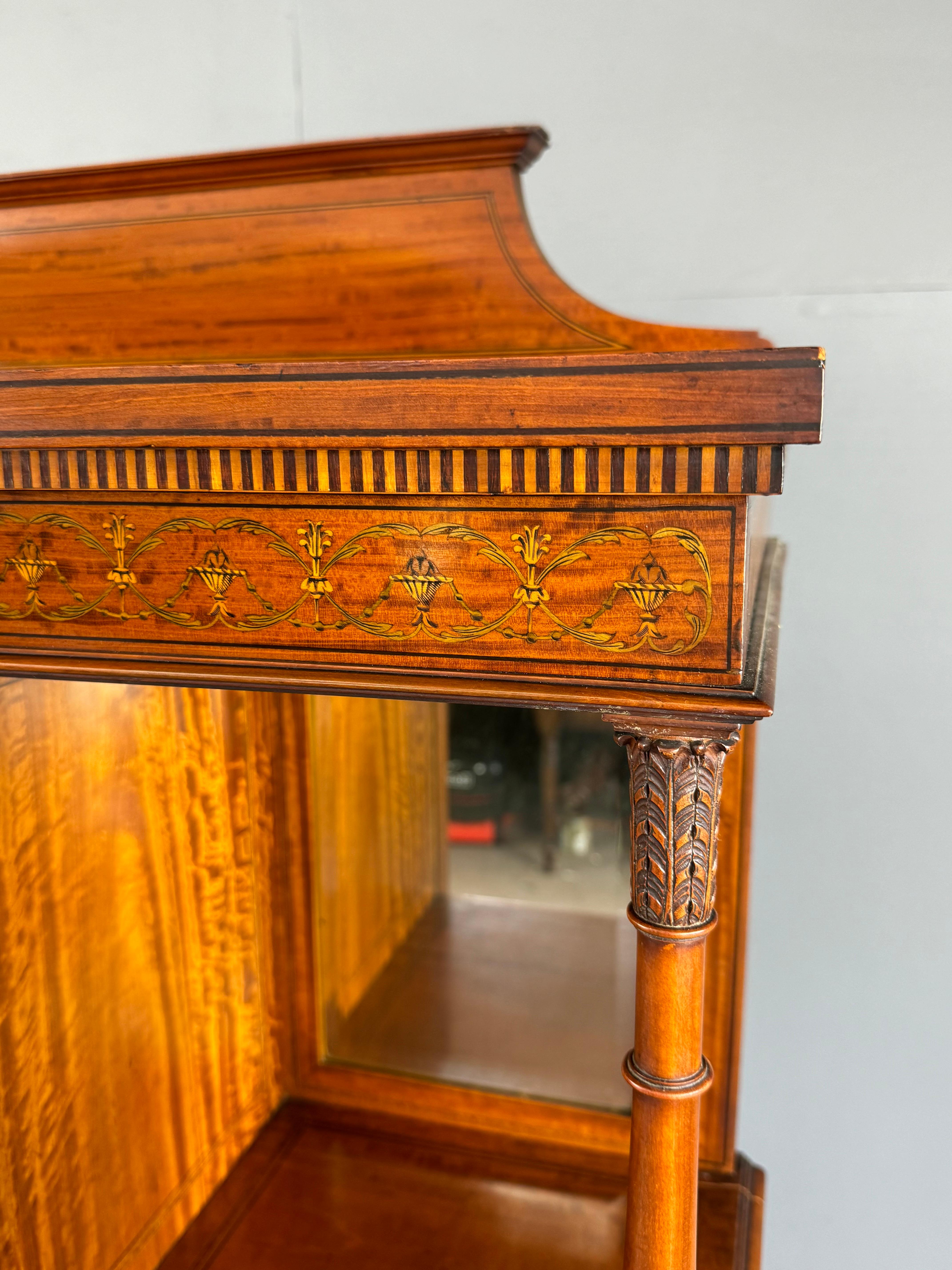 Fine quality Edwardian inlaid satin wood display cabinet by maple & Co London Paris 
The cabinet has very fine inlay detailing with fine carved columns , it is all original including the lining .
Very good condition and great colour ,
There are no