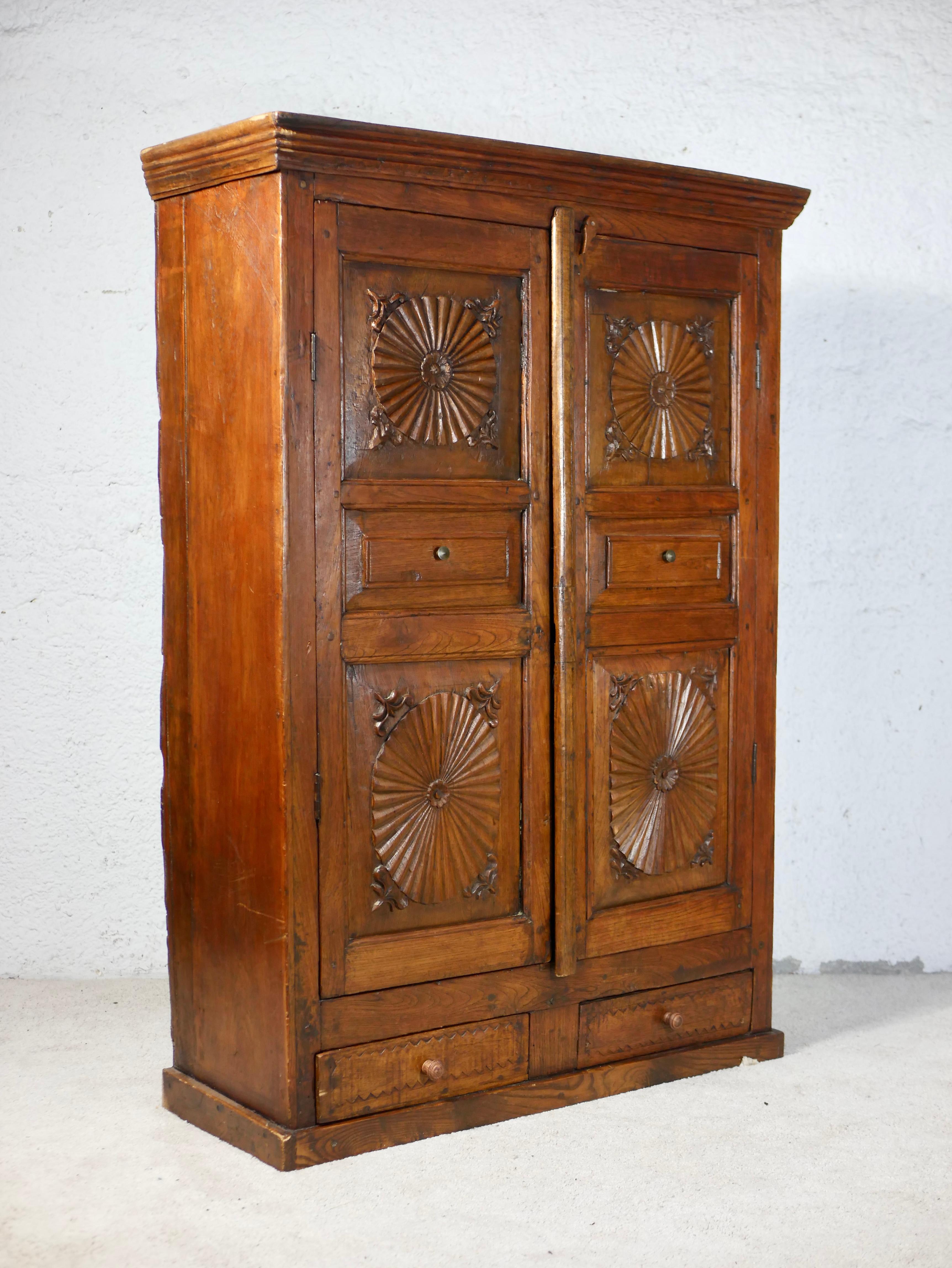 Country Mid-century Indonesian wood carved cabinet For Sale