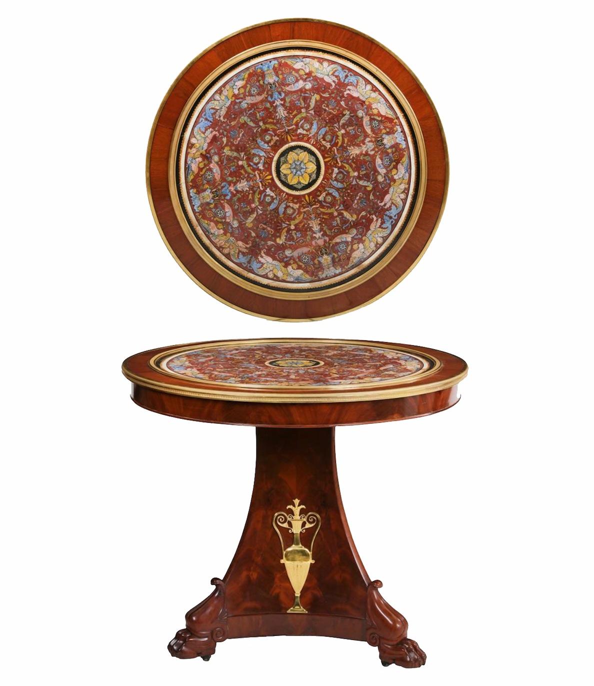 A 19th Century Continental Scagliola inset gilt bronze mounted mahogany center table.

Dimensions: 28.5