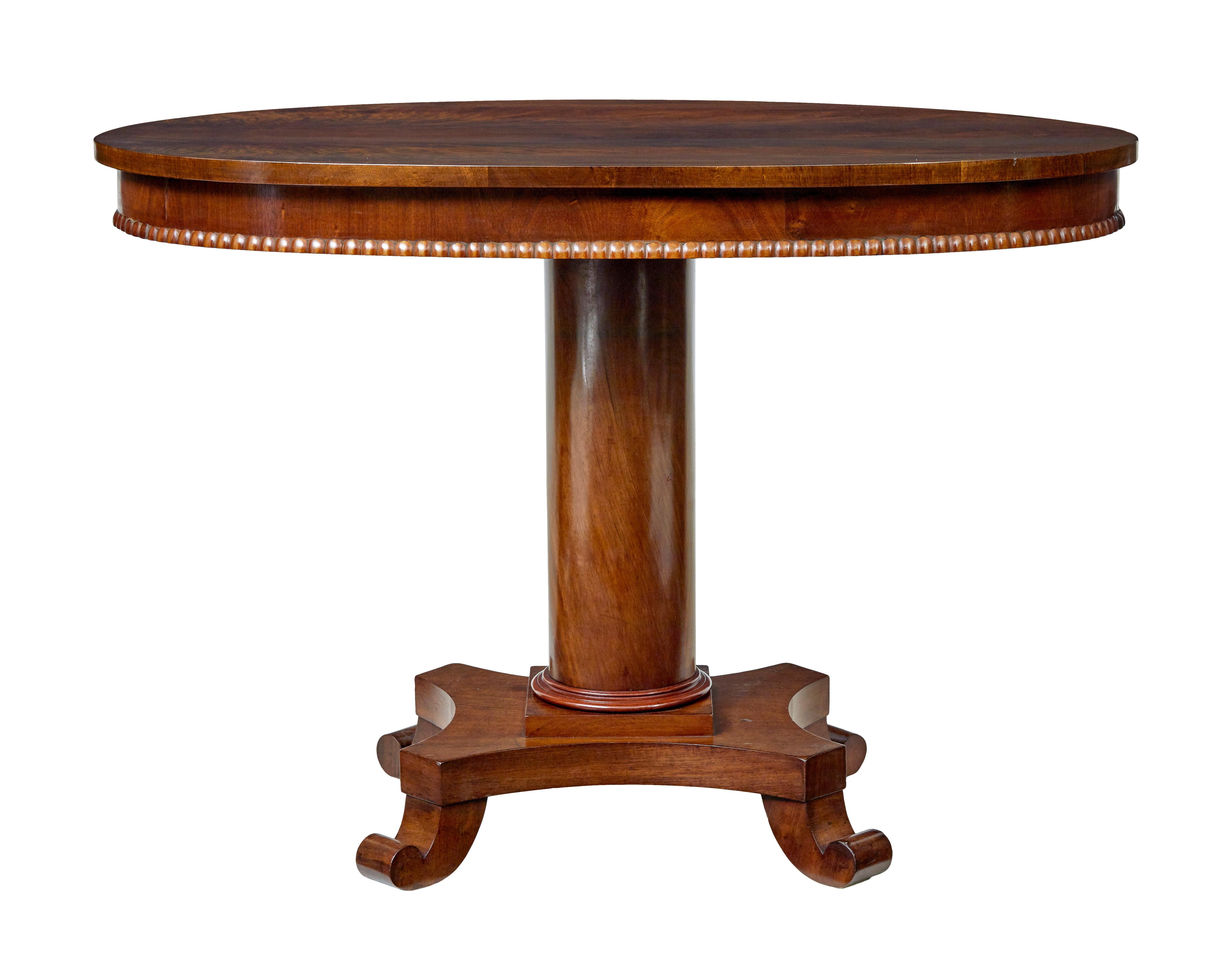 Swedish 19th century oval center table circa 1890.

Simple and elegant piece of Scandinavian design with this multi functional occasional table.

Matched flame mahogany top surface which sits above an apron with beaded detailing around the lower