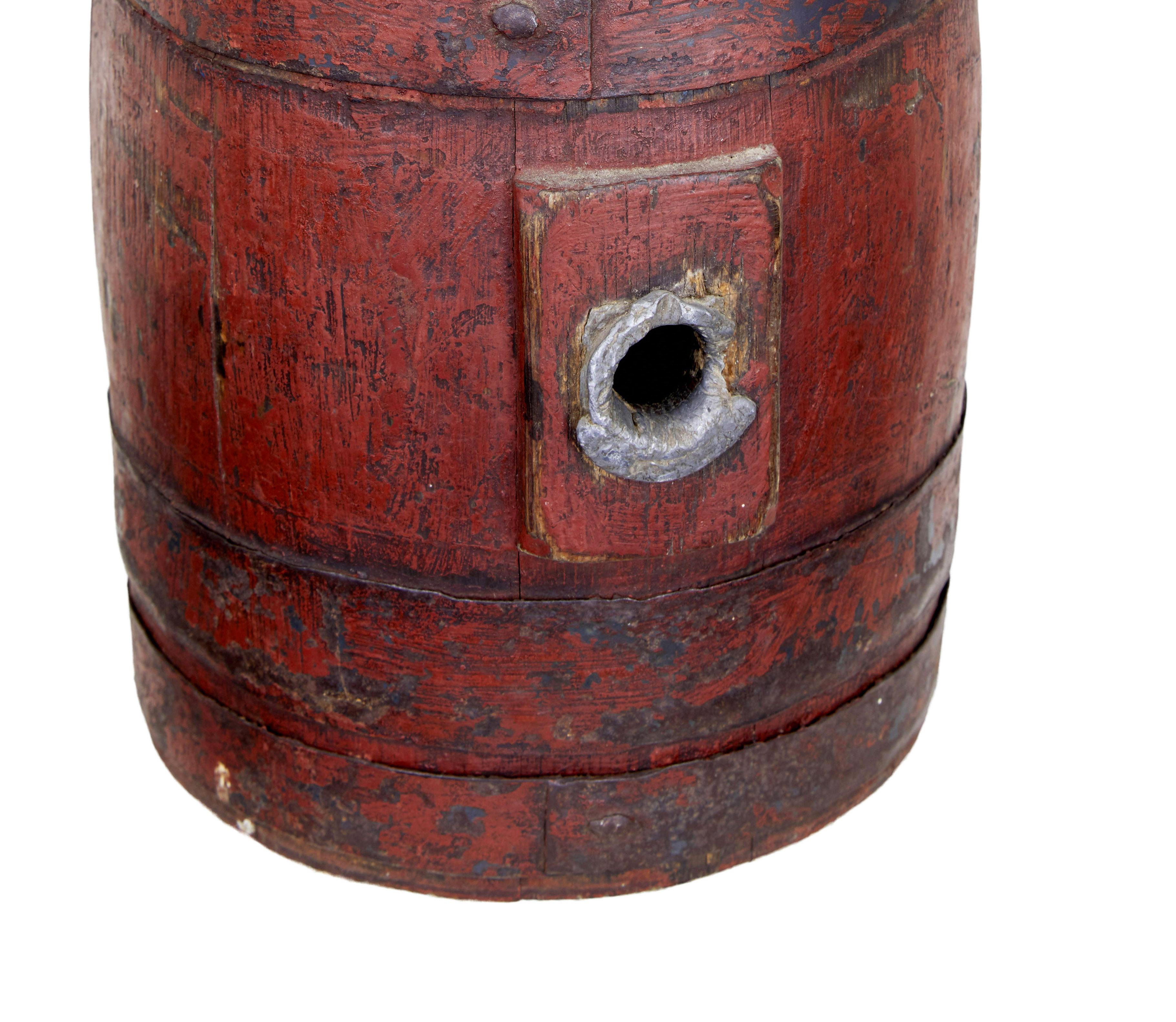 19th century Scandinavian painted oak barrel, circa 1870.

Beautiful miniature oak barrel used for storage and ageing of spirits. Hand painted in traditional colours, with metal strap work. Lead lined entrance to wear the cork is placed. Original