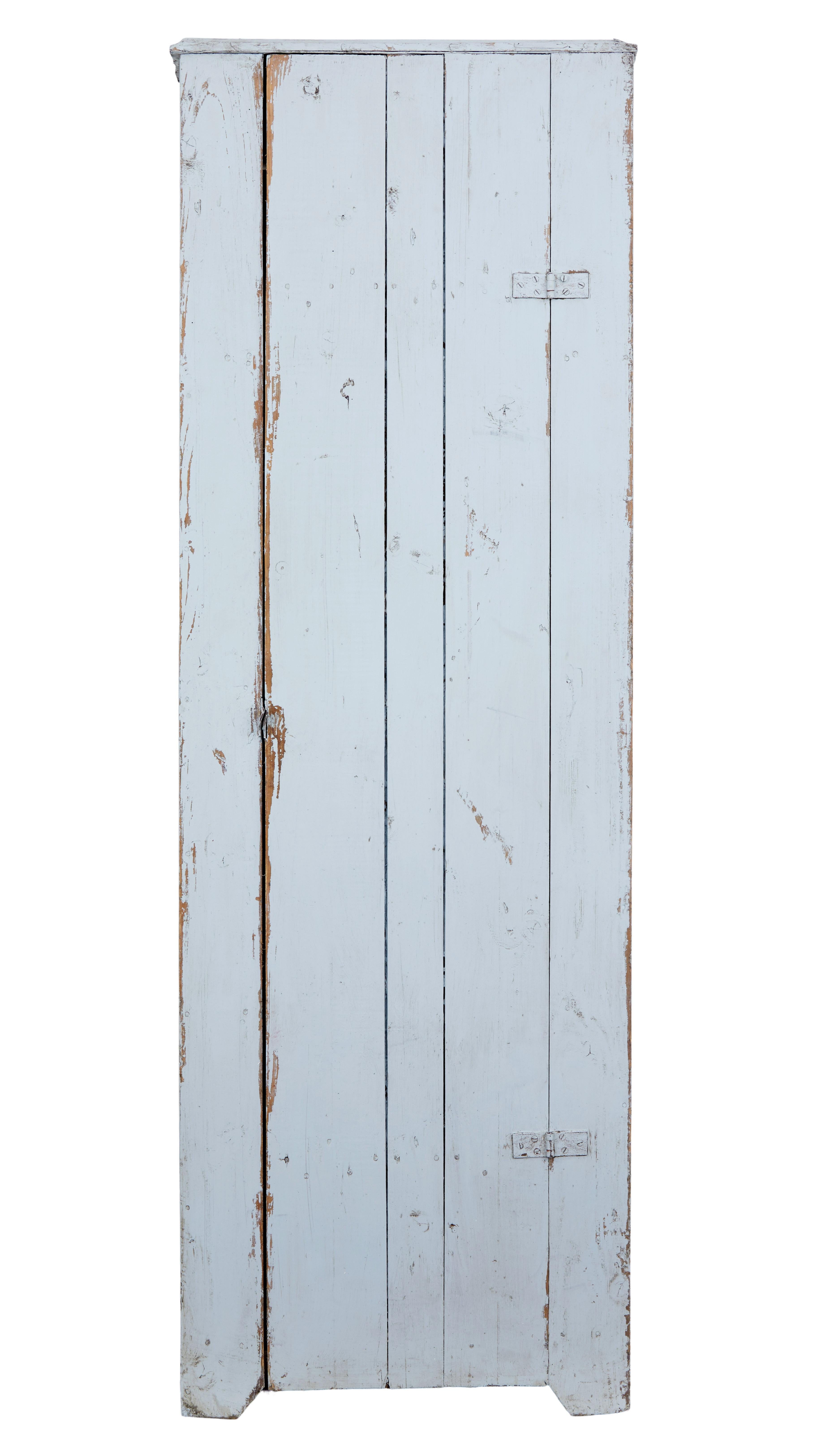 19th century Scandinavian painted pine kitchen cupboard, circa 1890.

Useful narrow painted pine cupboard, using pine boards. Single door opens to reveal 3 shelves in a fixed position.

Ideal for use in small spaces to provide maximum