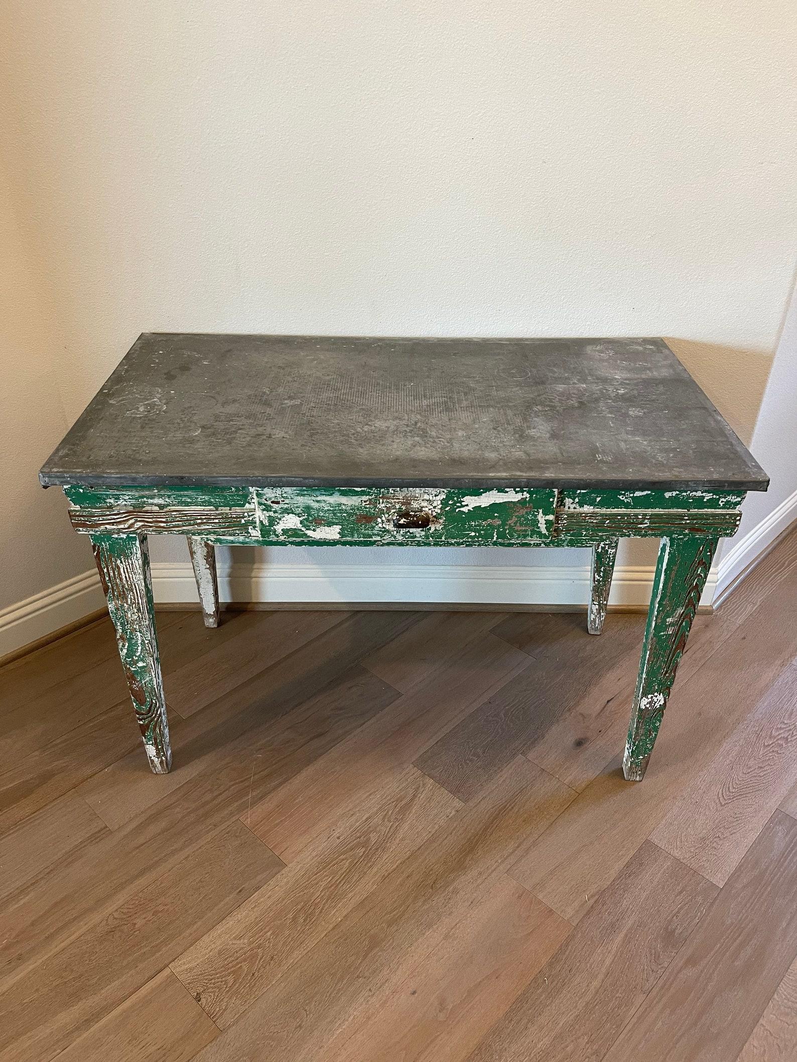 A Scandinavian antique painted wood galvanized metal top work table with beautifully aged distressed chippy paint patina. 

Born in the 19th century, hand-crafted of solid pine wood, classic Gustavian taste - simple angular Parsons table form,