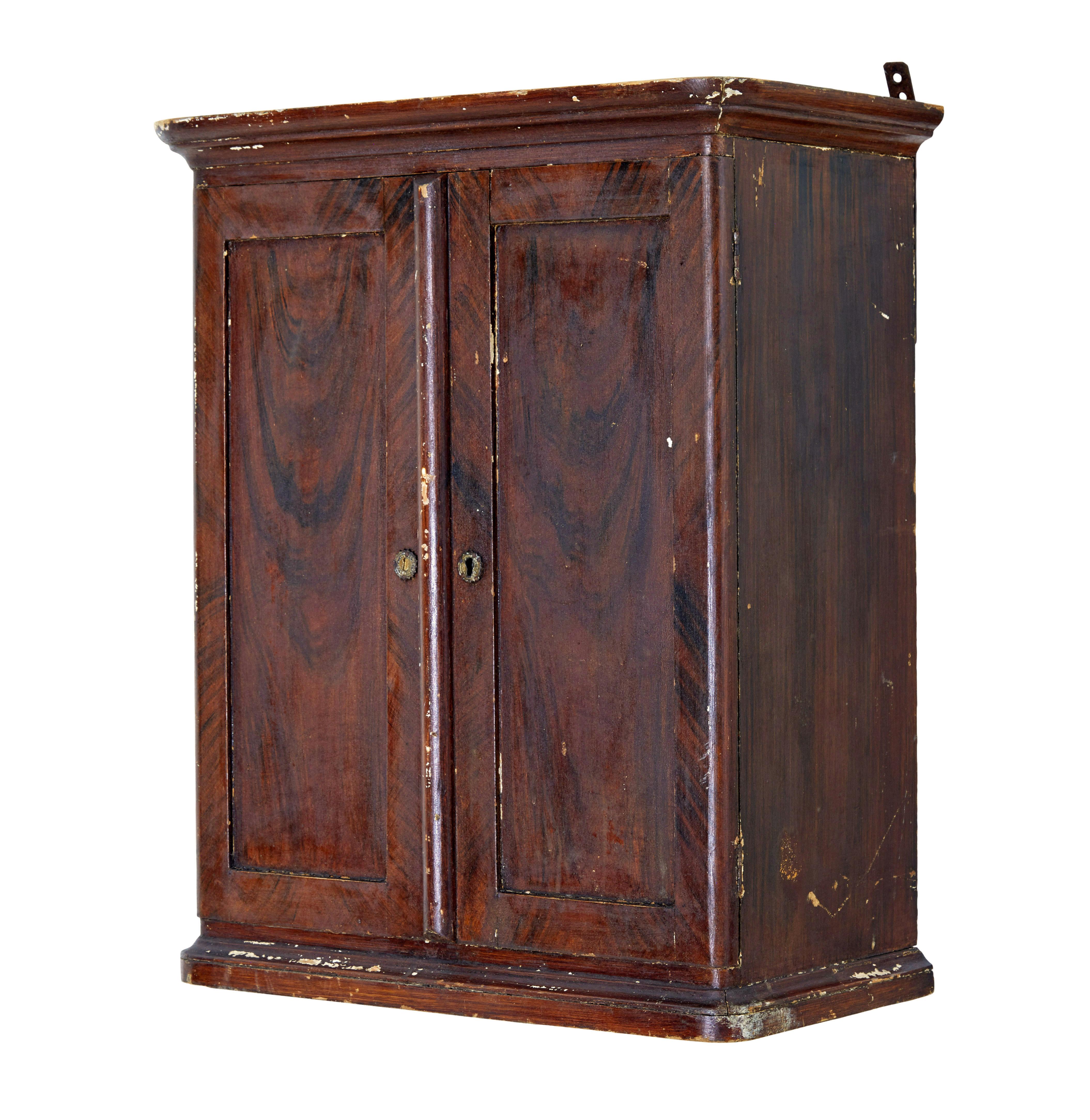 Hand-Carved 19th century Scandinavian painted wall cabinet For Sale