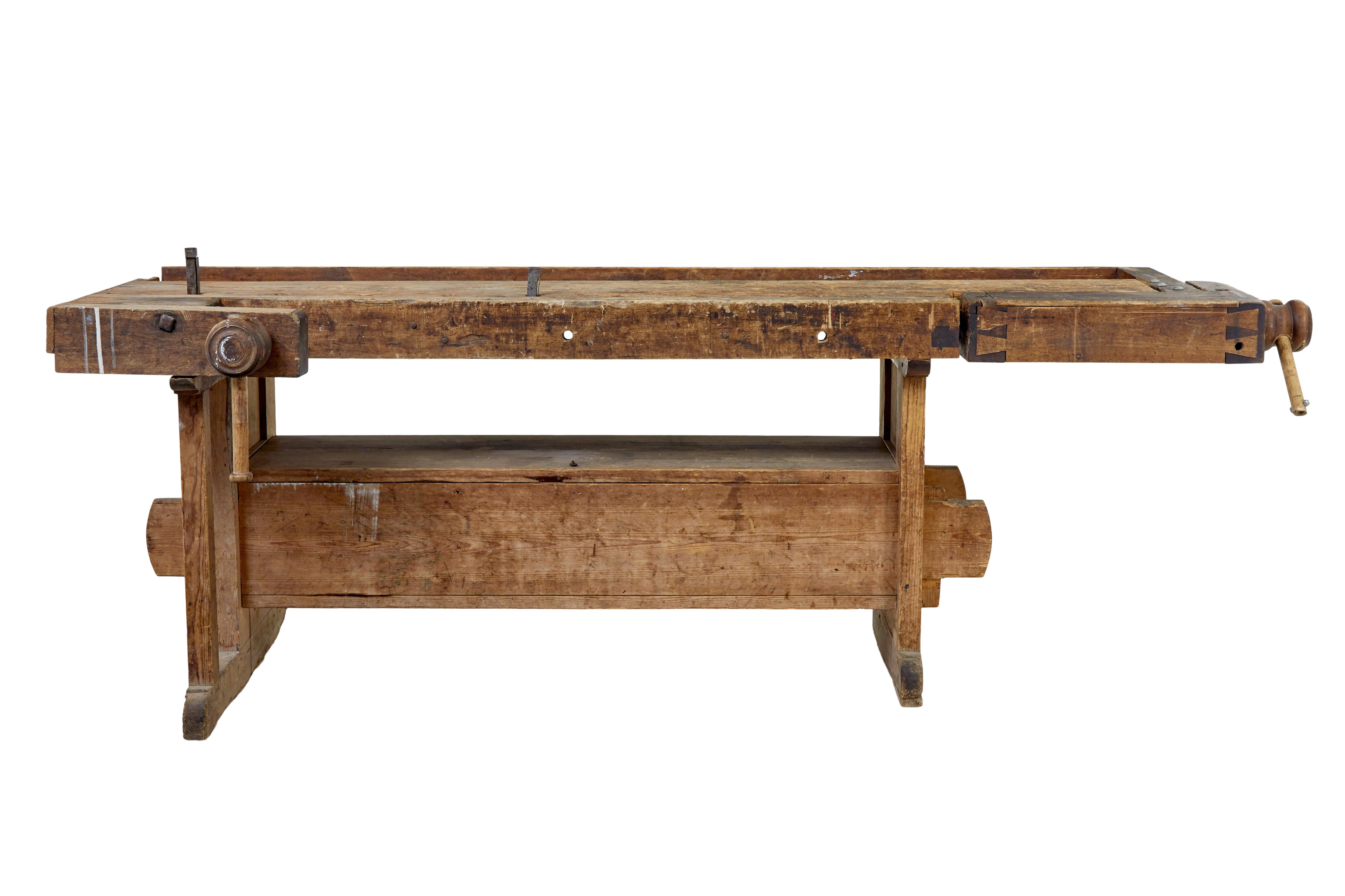 19th century Scandinavian trestle pine workbench circa 1890.

Good quality Swedish pine workbench which is still in good usable condition as a workbench or maybe even used today as a quirky sideboard.

Conventional layout with a trough to the back,