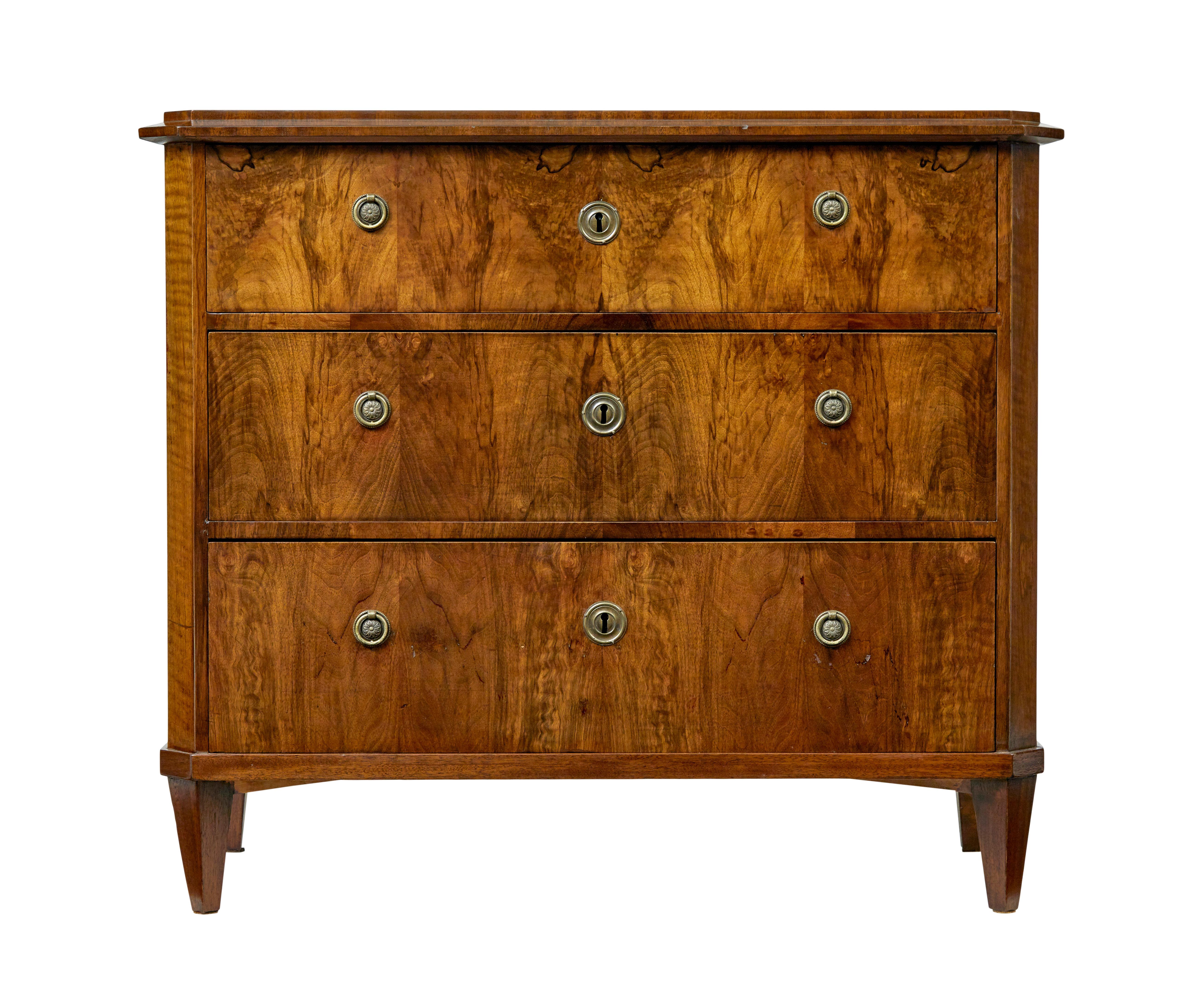 19th century Scandinavian walnut chest of drawers circa 1880.

Good quality Swedish chest of drawers unusually made in walnut.

Rectangular top with moulded edge and canted front corners.  Below which are 3 drawers graduating in size from top to
