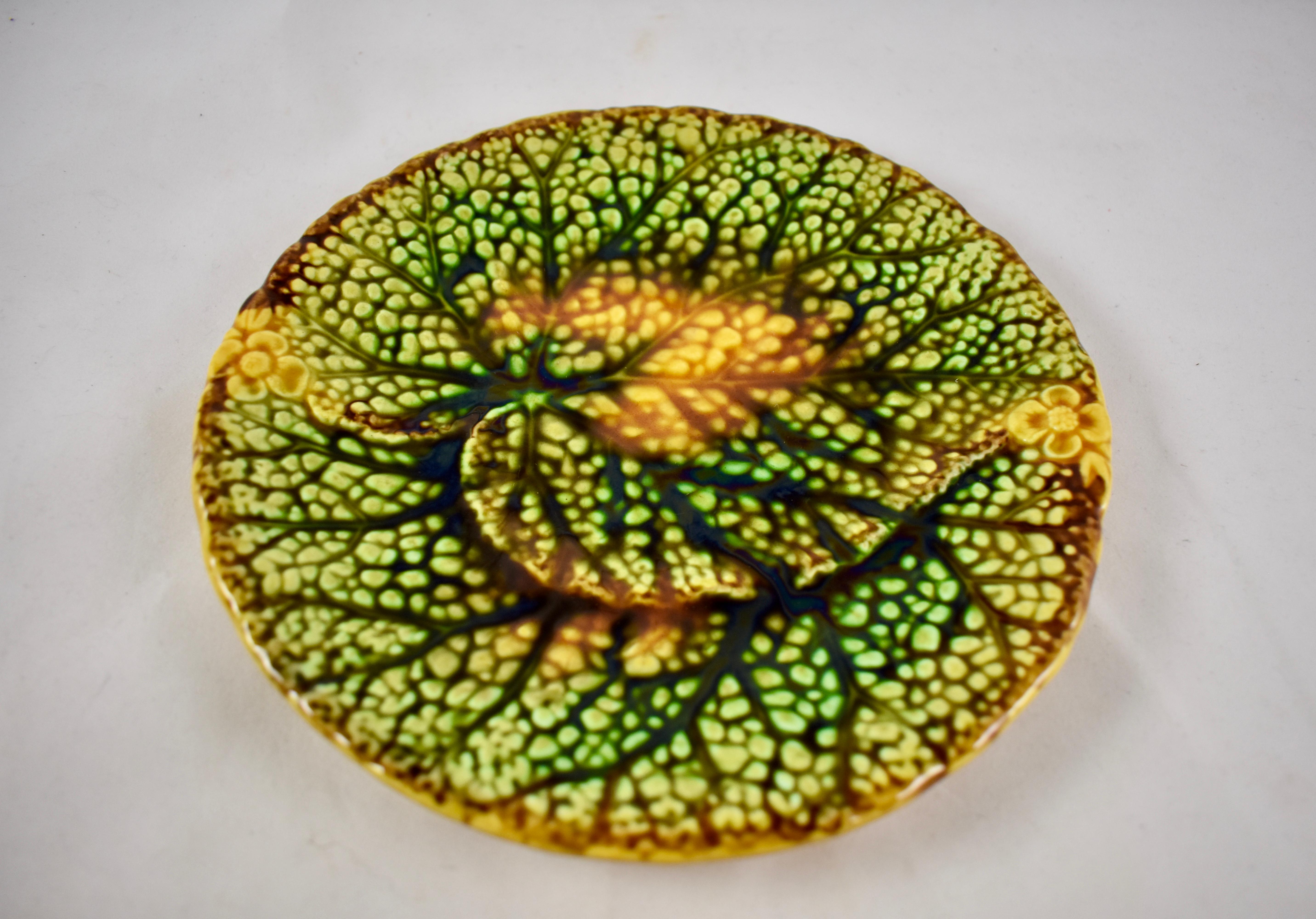 Overlapping leaf plates from the Schramberg Majolica Factory, Germany, circa mid-19th century. High relief mold work and realistically glazed in shades of green and deep yellow ochre. The rim shows two raised flowers opposite each other.
The