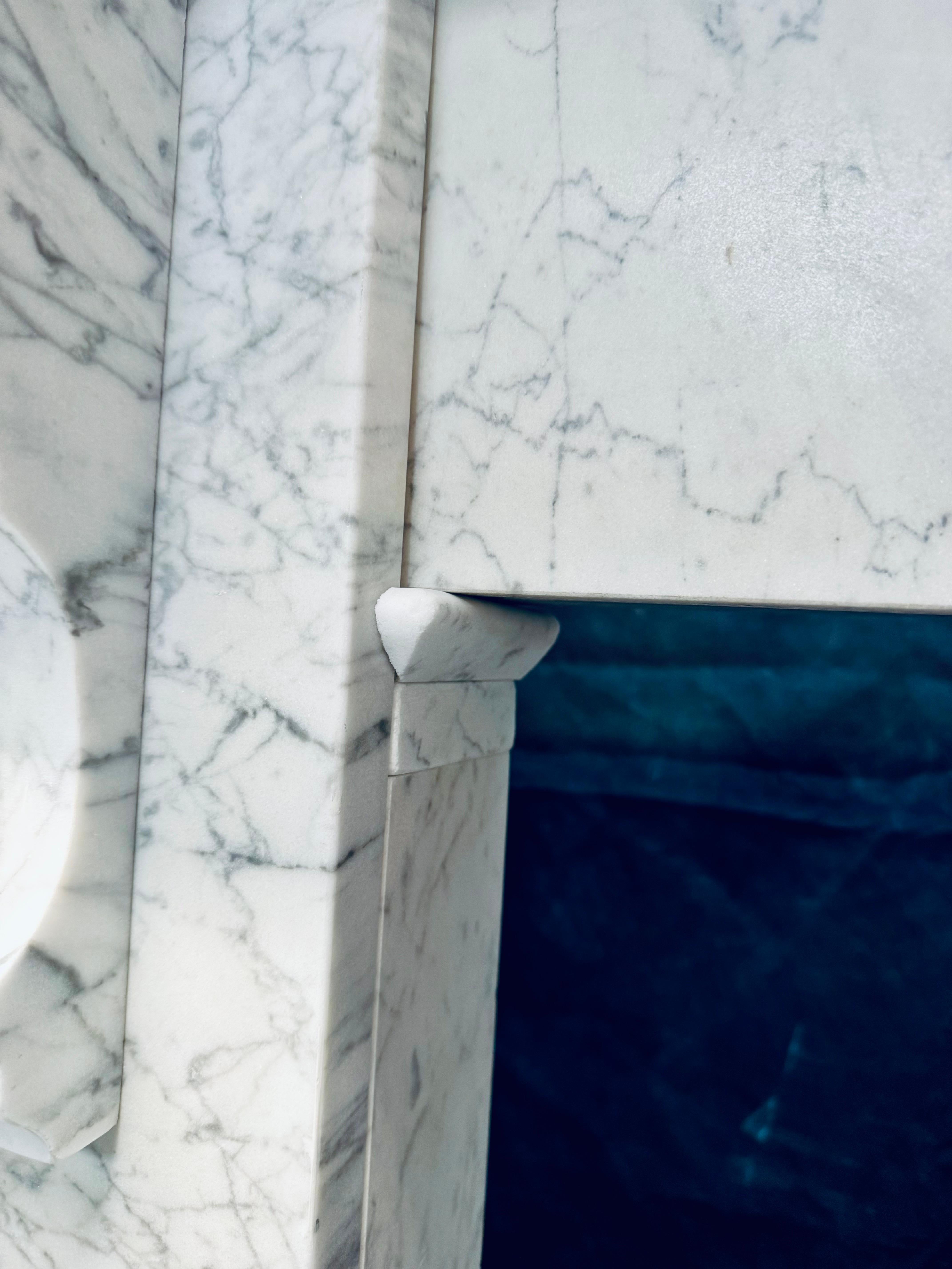 Late 19th Century 19th Century Scottish Victorian Carrara Marble Corbeled Fireplace. For Sale