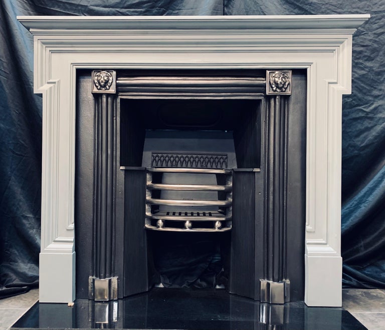 A simple but elegant 19th Century Victorian Scottish architrave framed fireplace surround. A moulded hardwood shelf sits above a horizontal box architrave with dog leg returns, revels have cock bead joining balls all resting on plain foot blocks.
