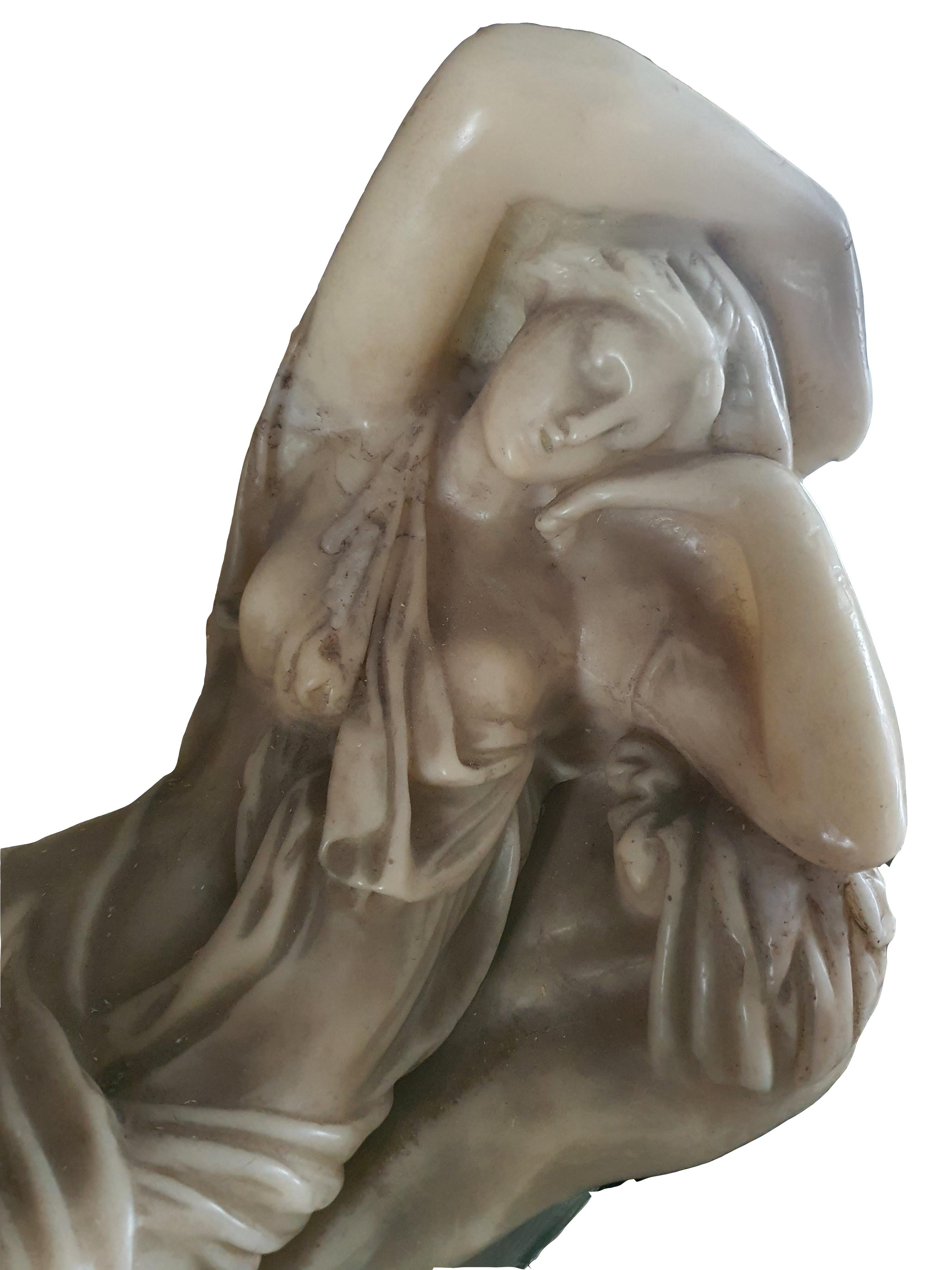 Elegant wax sculpture, finely crafted. Depicting a reclining lady.