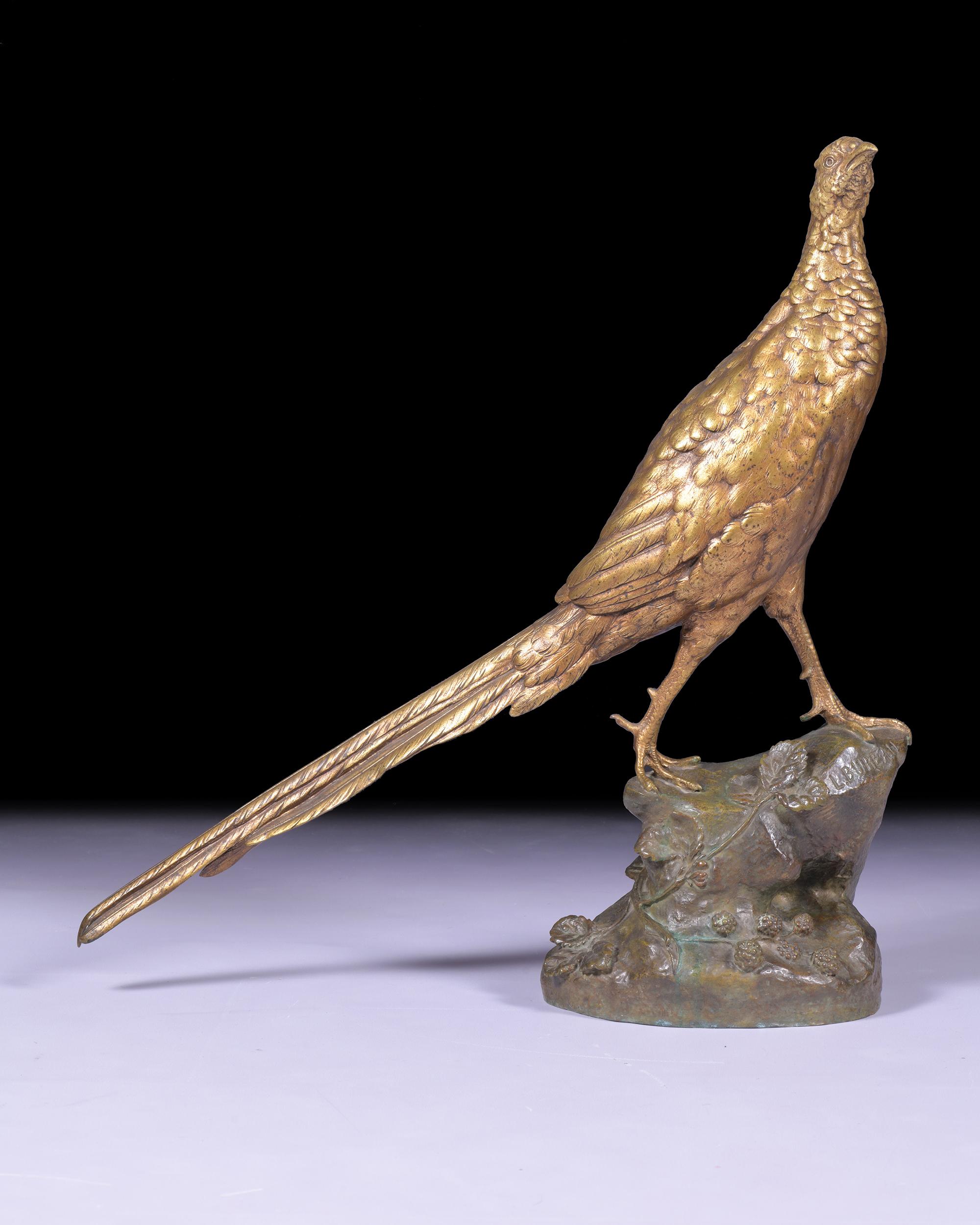 A very fine and opposing bronze sculpture of a Pheasant by Léon Bureau (1866-1906), the life-size figure with fine pen drawing, gold patinated bronze on floral terrain base, signed in the casting, stamp of ''Société des Bronzes de Paris''.

H: 22
