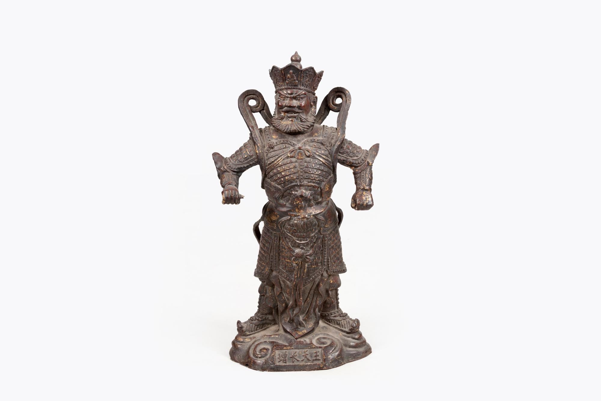 19th Century sculpture of Guan Yu (??), a guardian deity.

Guan Yu (d. A.D. 219), a warrior of the late Han dynasty (206 B.C.–A.D. 220) renowned for his valor and faithfulness, was later venerated as a saint in the Daoist pantheon. Elevated to the