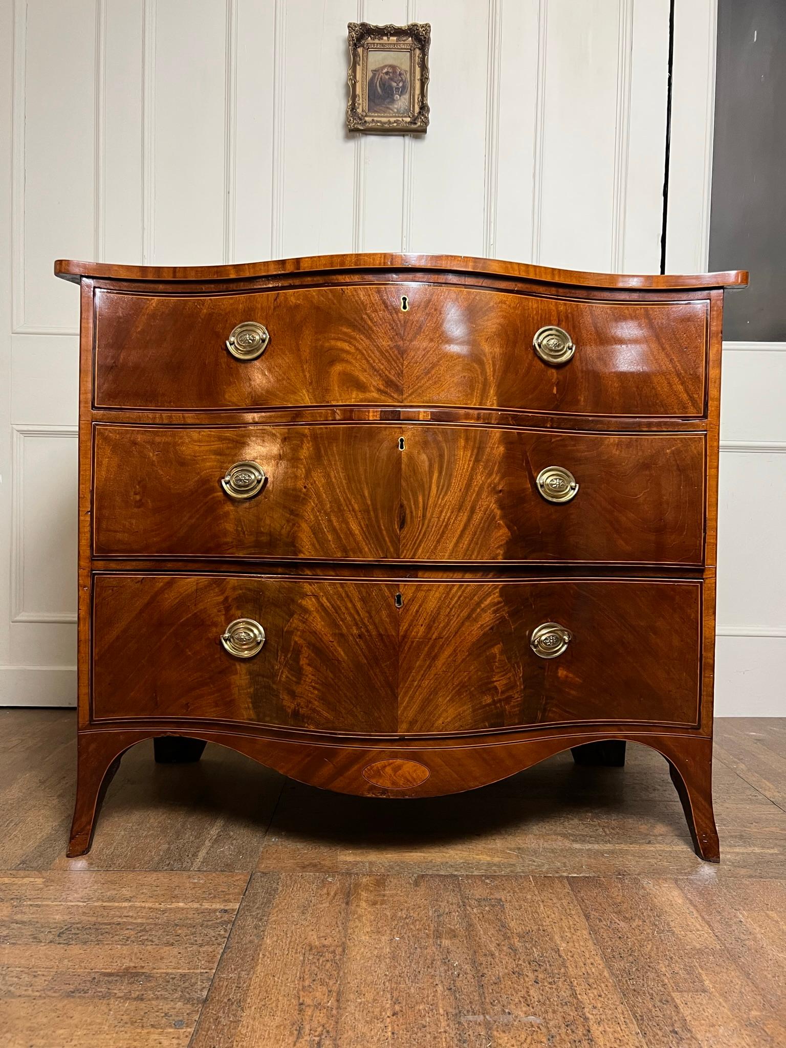 British 19th Century Serpentine Chest of Drawers For Sale