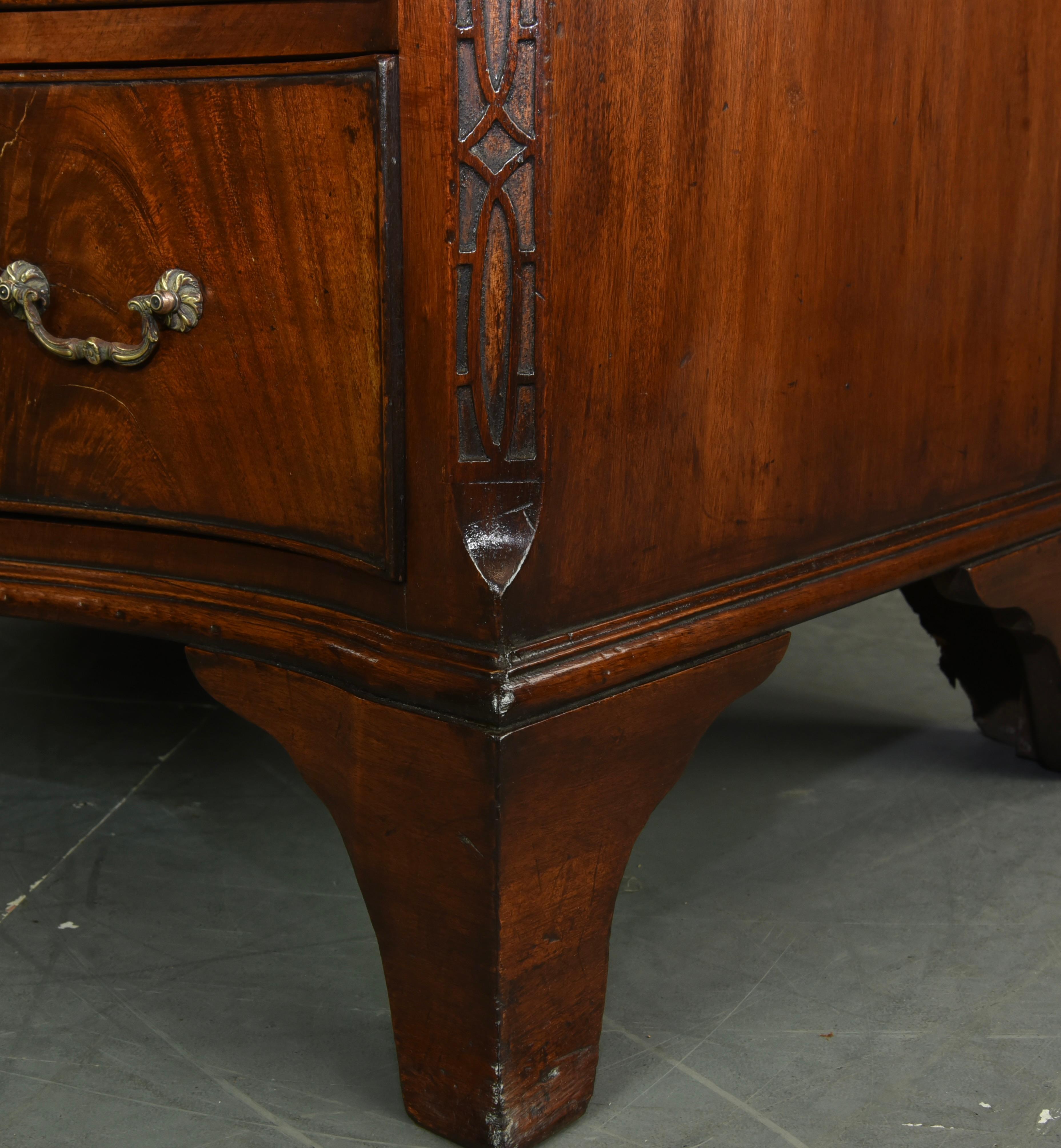 English 19th century serpentine mahogany bachelors chest