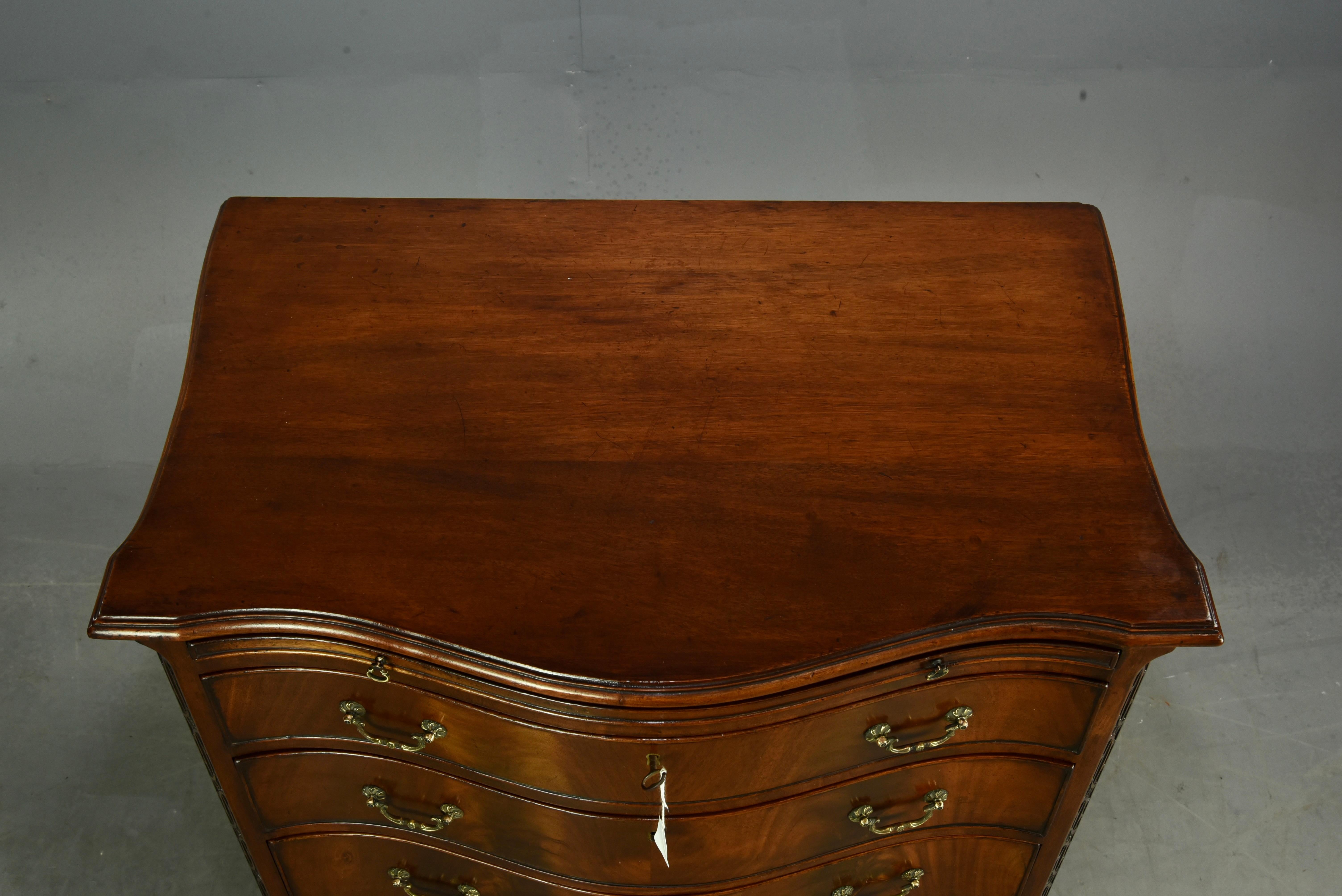 Mahogany 19th century serpentine mahogany bachelors chest