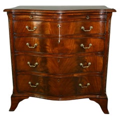 19th century serpentine mahogany bachelors chest 