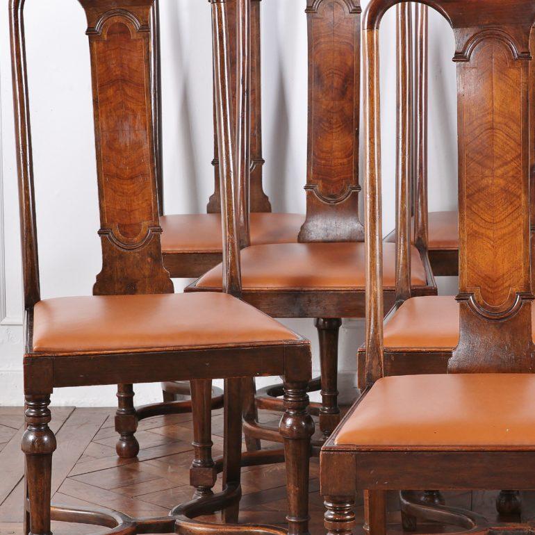A set of 12 “Waring & Gillows” walnut dining chairs.
