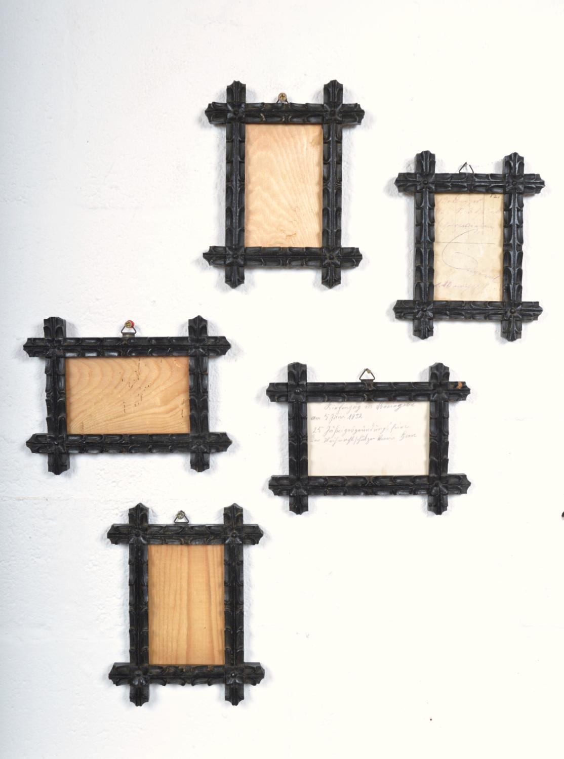 A beautifully carved set of five Bavarian ebonised picture frames elaborately carved using the ‘notch cut’ technique, each frame held together with a cross-lap joint. Dating from the mid 19th Century, the set of five matching hand-carved fruitwood