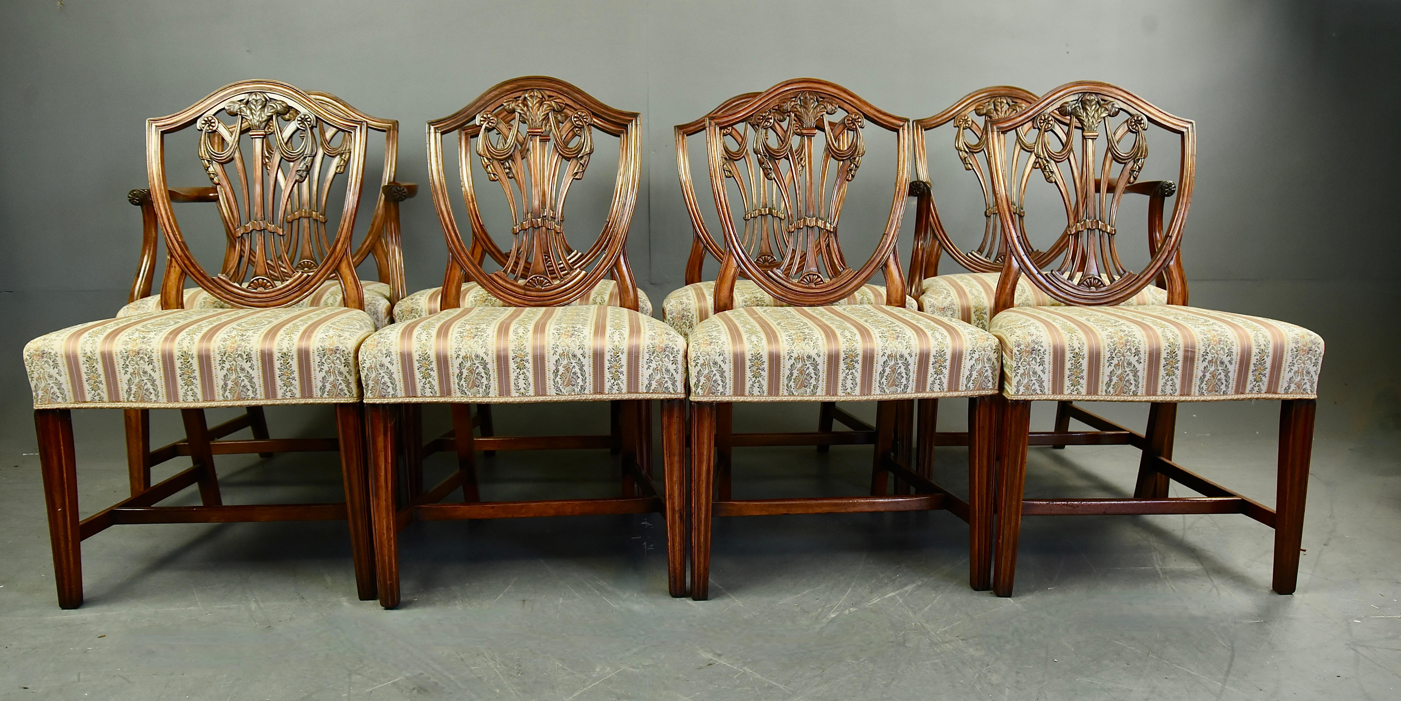 Fine set of eight Georgian Hepplewhite shield back dining chairs .stamped Gillow.
These stunning chairs have been made by the finest English furnitures makers .
The fine hand caved backs feature the prince of Wales feathers that have been carved to